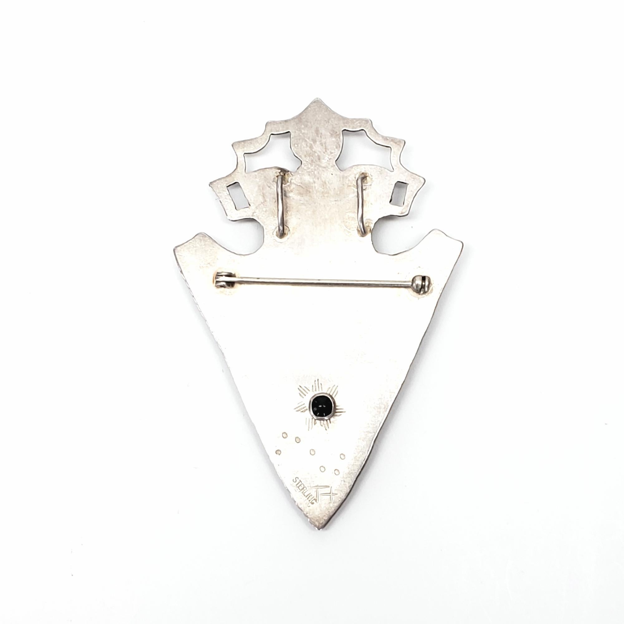 Sterling silver and agate arrowhead pin/pendant by Native American Hopi artisan.

Beautiful piece can be worn as a pin or pendant, features large triangular banded agate  - possibly from Keneenaco Point, Michigan, tear drop druzy and round