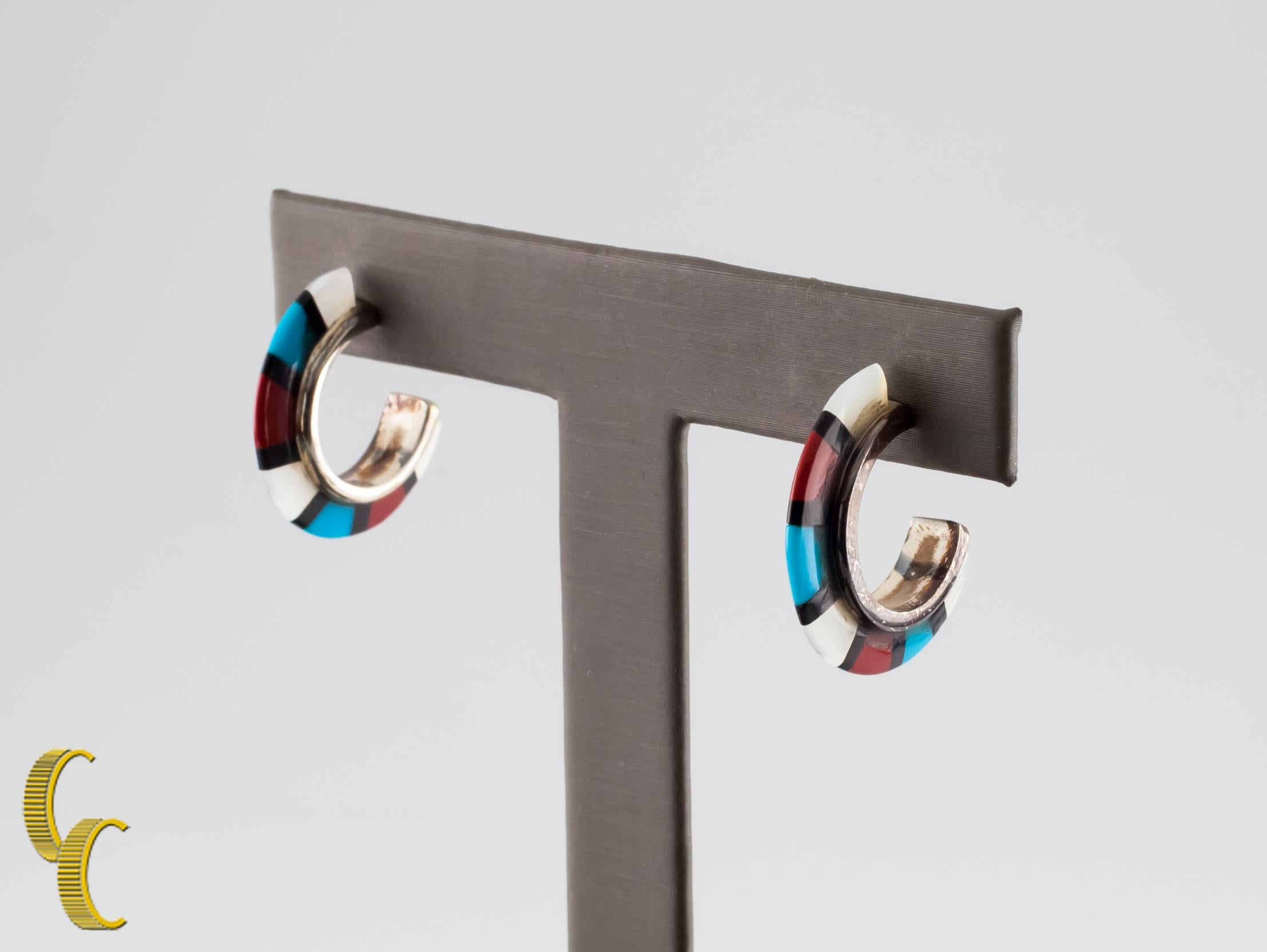 Sterling silver half hoop earrings, featuring coral, turquoise, and mother-of-pearl set in sterling silver.
Length: 20 mm.
Metal: 0.925 sterling silver.
Weight: 4 grams.