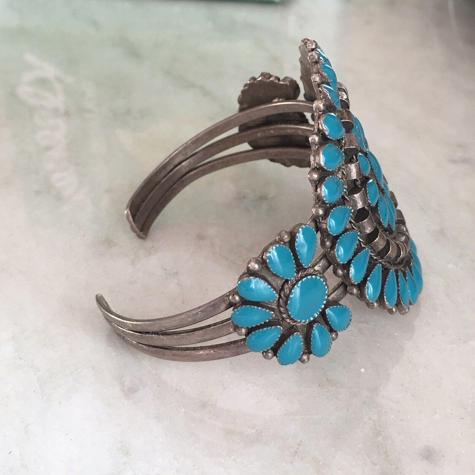 Native American Sterling Silver Hand Made Turquoise Cluster Cuff Bracelet Weighting 31.4 grams, tested Sterling in excellent condition, no missing stones possibly Zuni