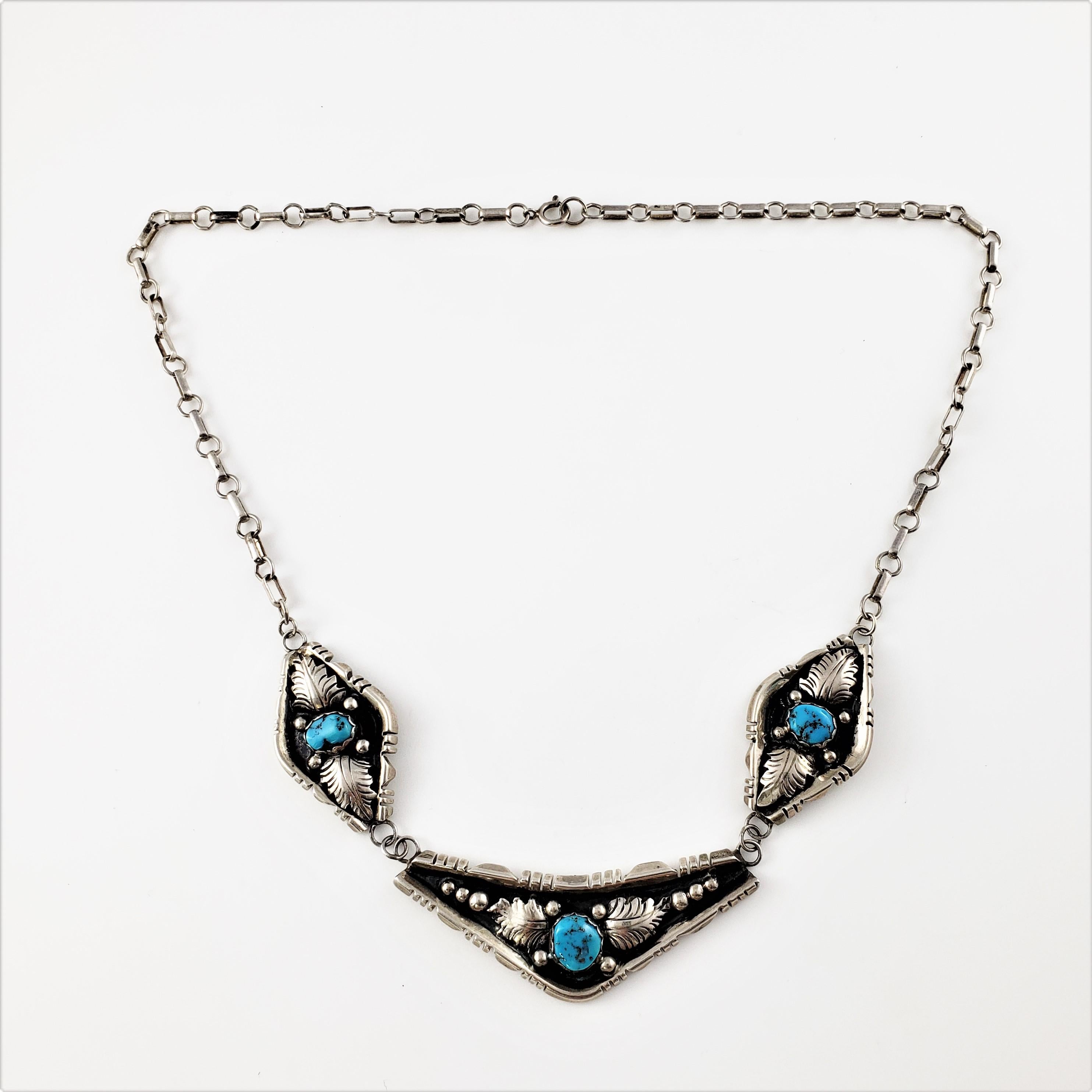 Vintage Native American Sterling Silver Oxidized Turquoise 3 Panel Link Necklace-

This lovely Native American three panel necklace features three turquoise stones (center; 10 mm x 9 mm, sides: 10 mm x 7 mm each) set in sterling silver.

Size: