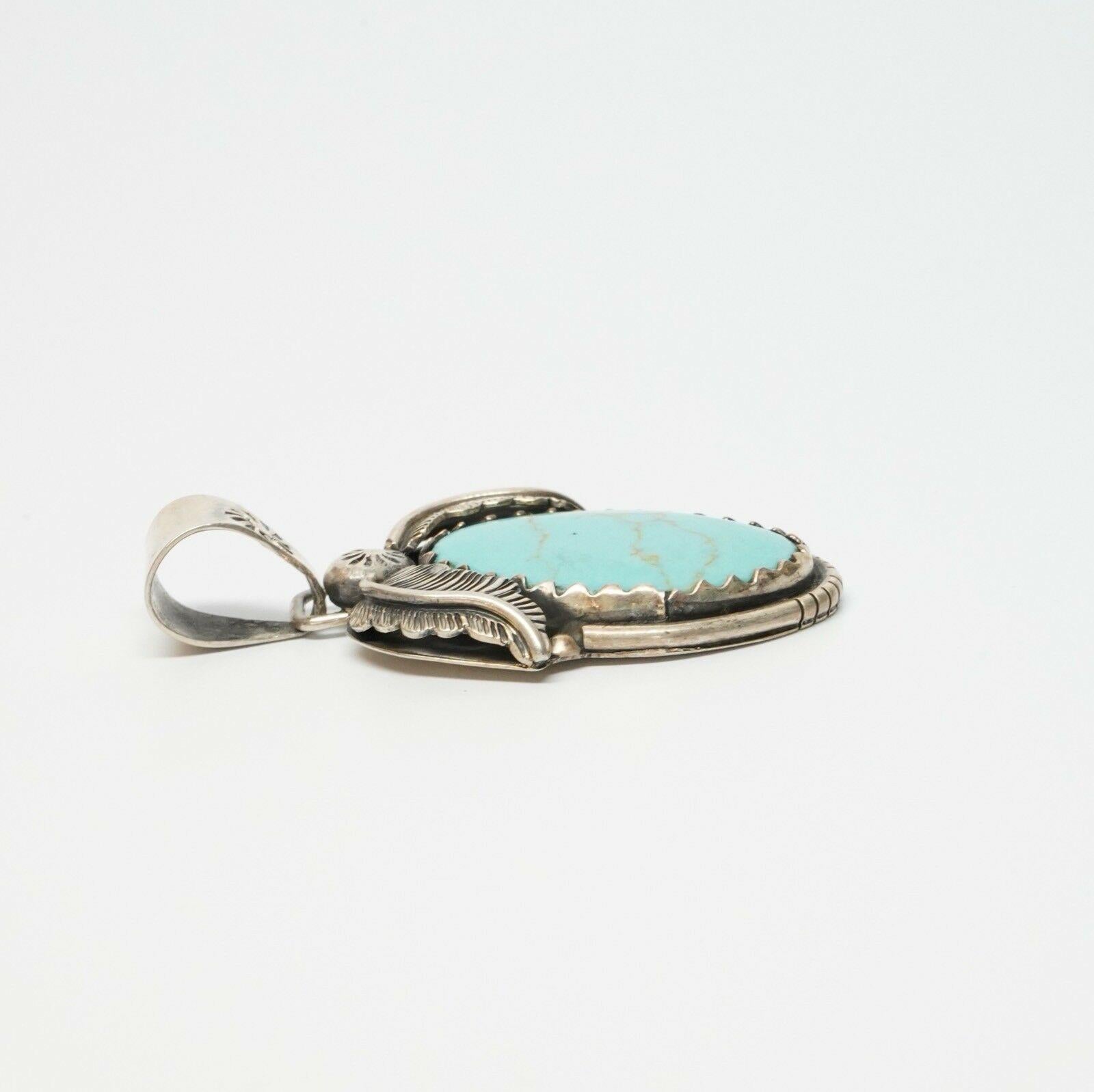 Mixed Cut Native American Sterling Silver Turquoise Pendant