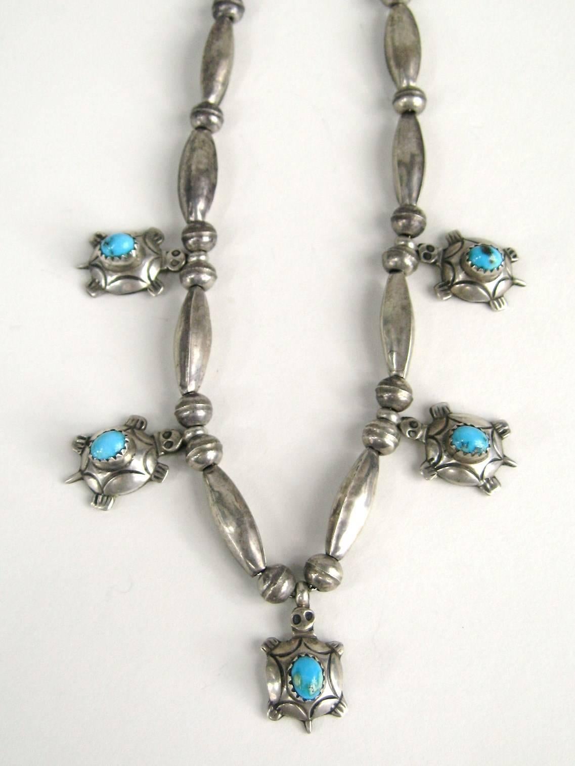 1950s sterling silver beaded necklace with 5 turtles. Turquoise set in each turtle. measuring 16 inches. Hallmarked on the back. Patina as found. This is out of a massive collection of Hopi, Zuni, Navajo, Southwestern, sterling silver, costume