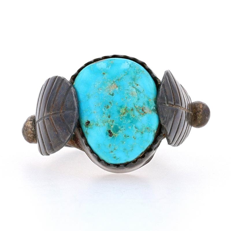 Size: 6 1/2

Native American

Metal Content: Sterling Silver

Stone Information
Natural Turquoise
Treatment: Routinely Enhanced
Color: Greenish Blue

Style: Cocktail Solitaire
Theme: Leaves
Features: Smoothly Finished with Etched