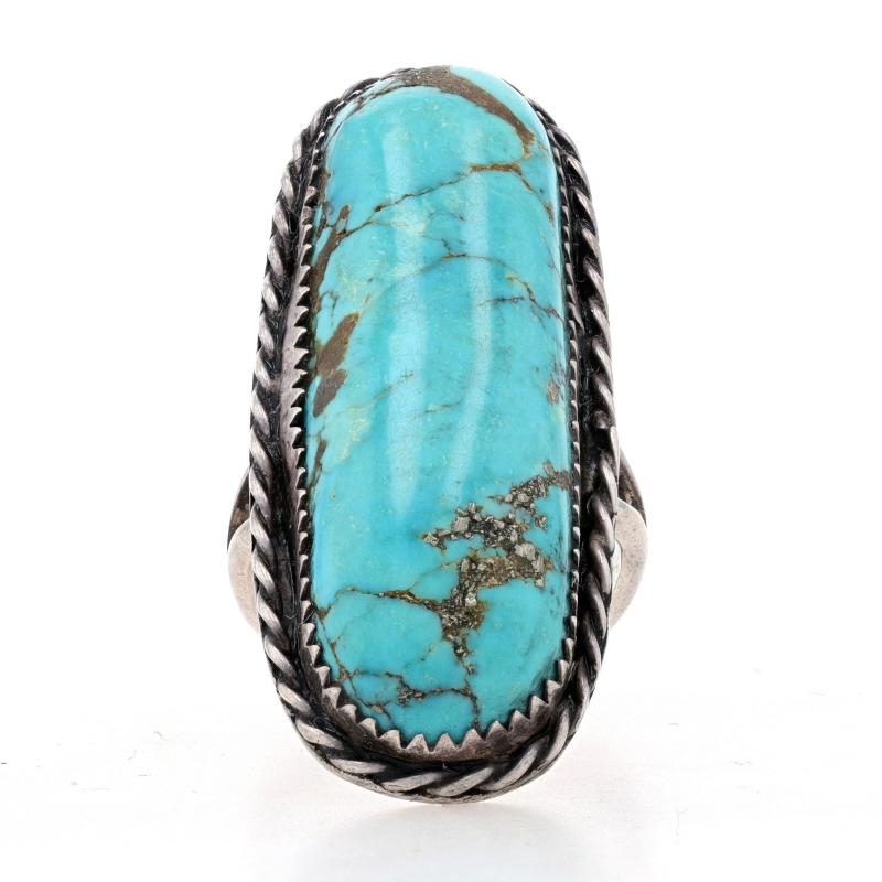 Size: 7 1/4
Sizing Fee: Up 1 size for $30

Native American

Metal Content: 925 Sterling Silver

Stone Information

Natural Turquoise with Pyrite Matrix
Treatment: Routinely Enhanced
Cut: Oval Cabochon
Color: Bluish Green

Style: Cocktail Solitaire