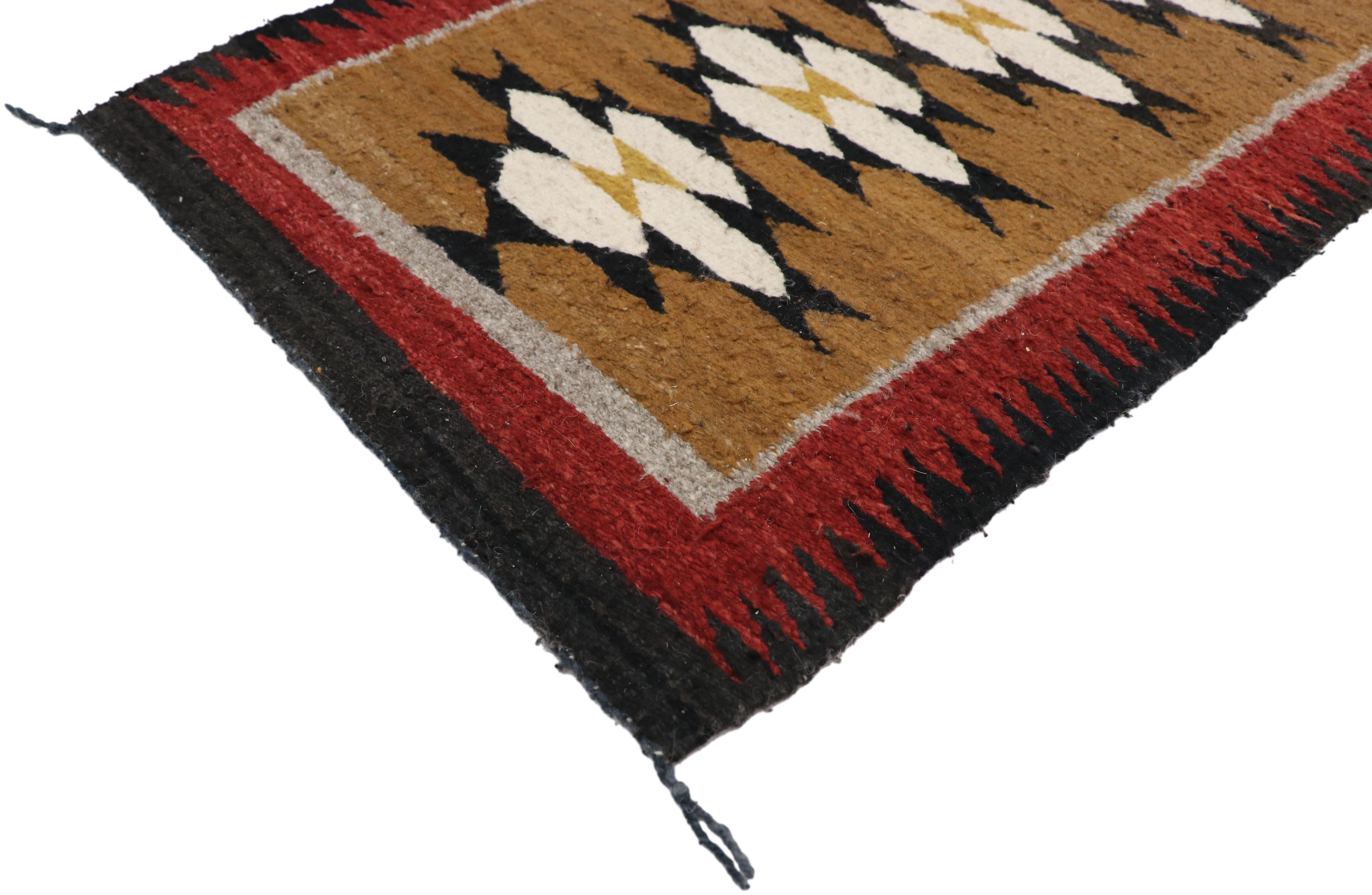 77341, native American Vintage Indian Navajo Kilim runner with Adirondack Lodge style. This handwoven wool Native American vintage Indian Navajo kilim runner features fused triangles symbolizing the wings of the butterfly which represents