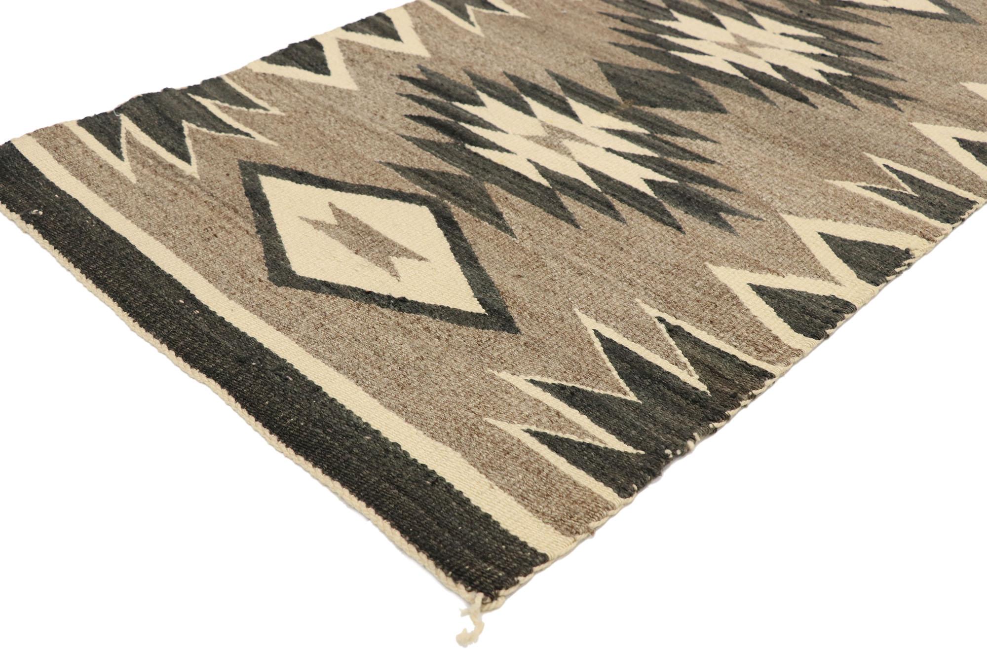 70677, Native American vintage Kilim rug with with Navajo Two Grey Hills style. Captivating and emanating Navajo vibes and Adirondack Lodge style, this handwoven wool vintage Native American Indian Kilim rug features two middle stars flanked with a