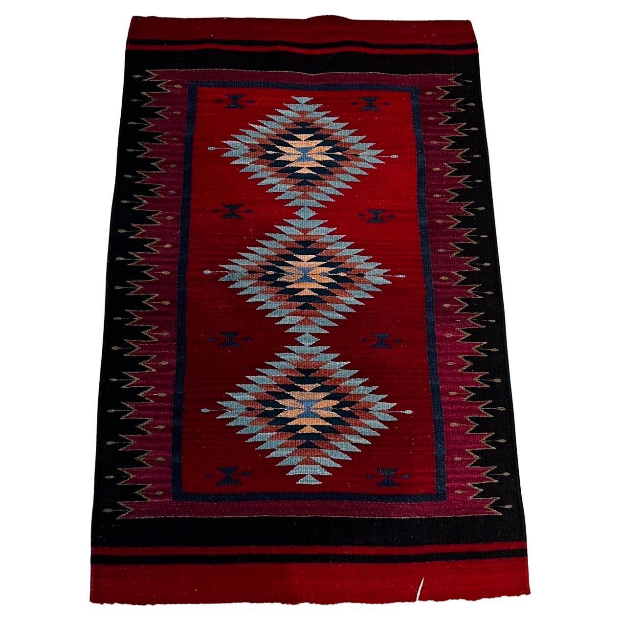Style of Native Navajo Wall Art Tapestry Rug
Vibrant colors red, black pink.
25.25 w x 39.25 tall
Preowned vintage unrestored condition.
Review images please.
