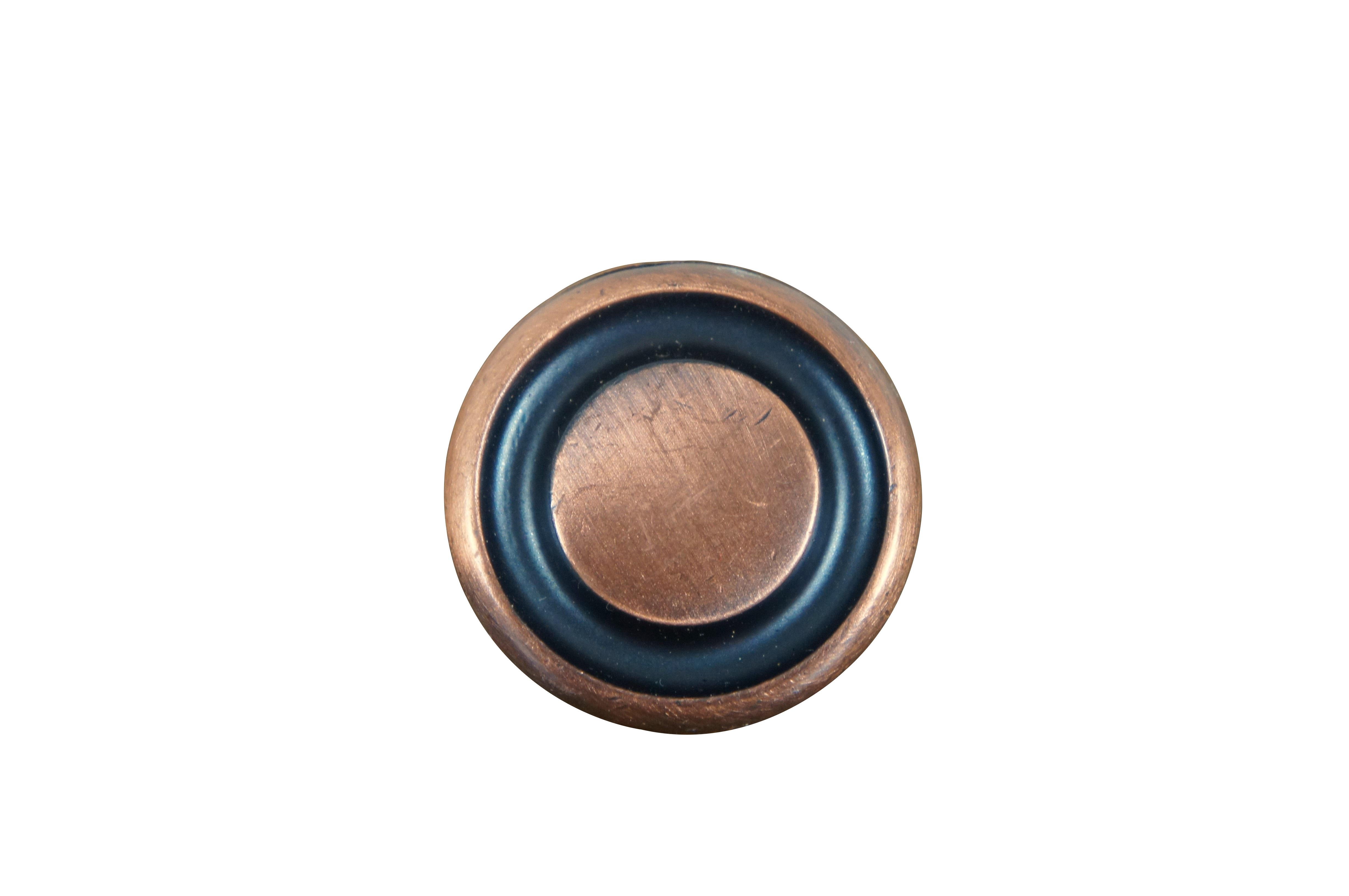 4 Available - Mid to late 20th century old-stock drawer / cabinet pulls. National Lock Company - Medalist, item number C275-10D Knob, Old Copper.  Round button shape with dark, recessed groove.

Dimensions:
1.375
