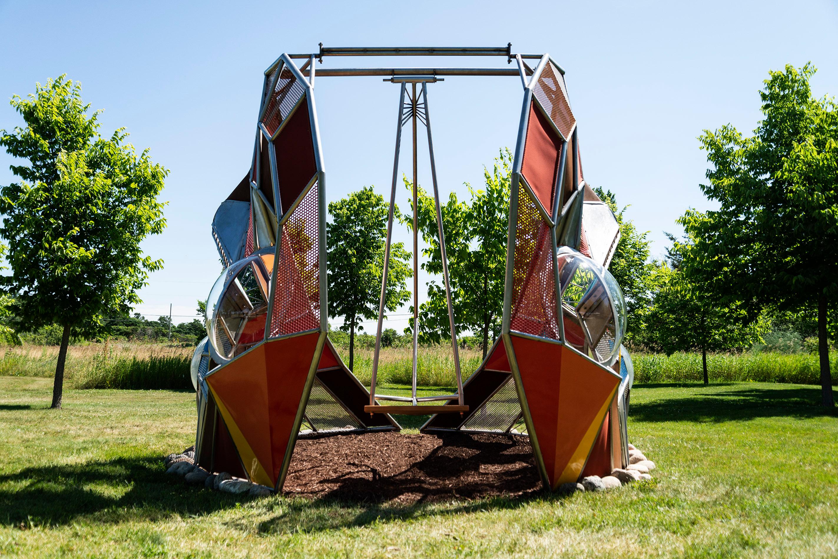 Natsuki Takauji Abstract Sculpture - Window II - interactive swing, abstract, wood, steel, acrylic, outdoor sculpture