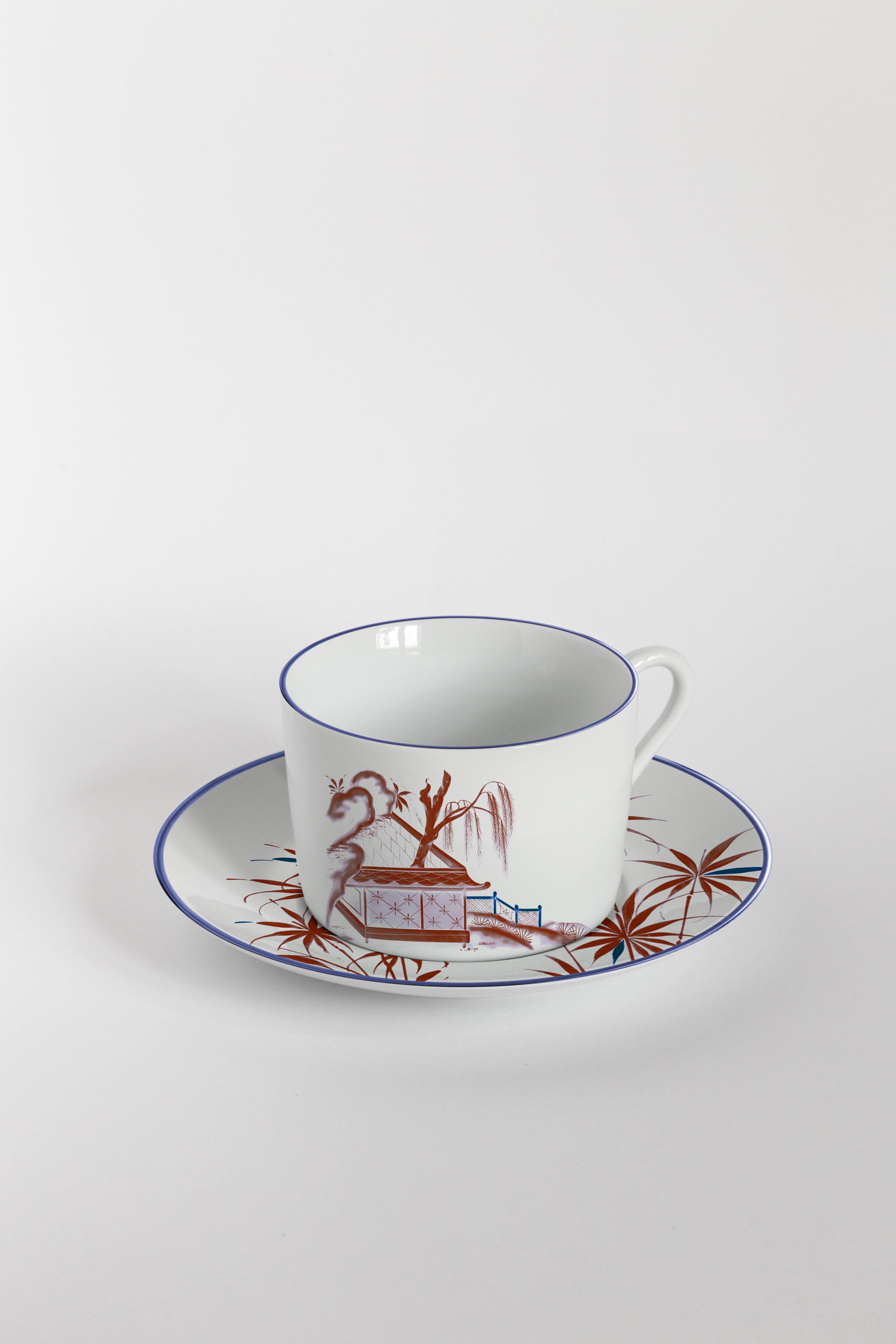 Bordeaux and blue are the primary colors of this Japan inspired collection of plates, where ancient Japanese scenes take place on the rivers of a fairy lake.
Tea set with 6 coffee cups and plates.