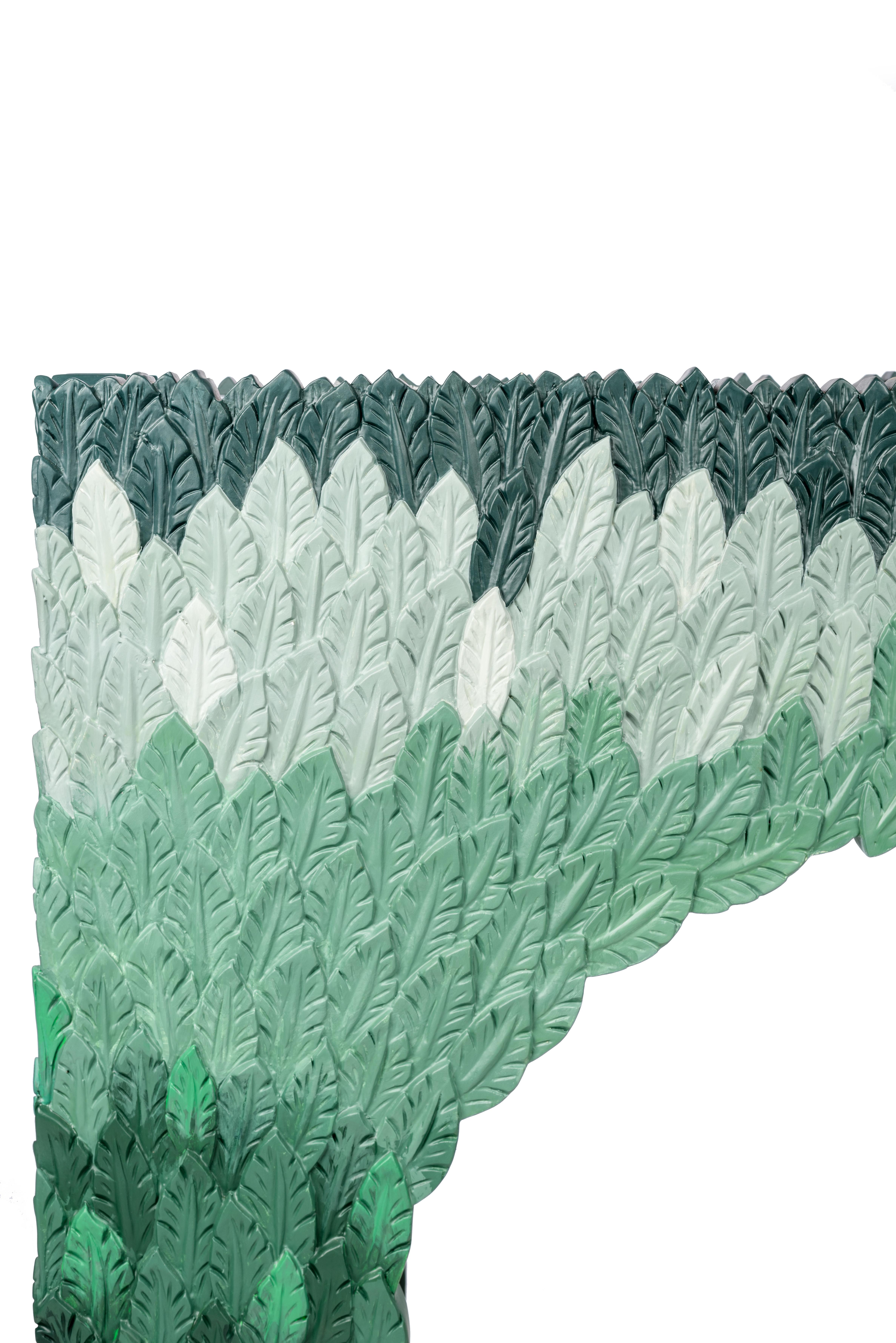 The Natura Console transports you into a secret garden nestled within the breathtaking Mediterranean. Featuring graceful wood-carved leaves in a pattern that mimics the gentle rustling movements of nature. This console embodies a bond between