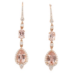 Orecchino Natura con morgenite 4,66cts e diamante 0,96cts in oro 18k