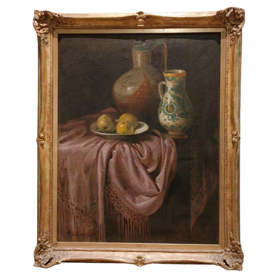 Still life with tablecloth, two pitchers and a plate with apples