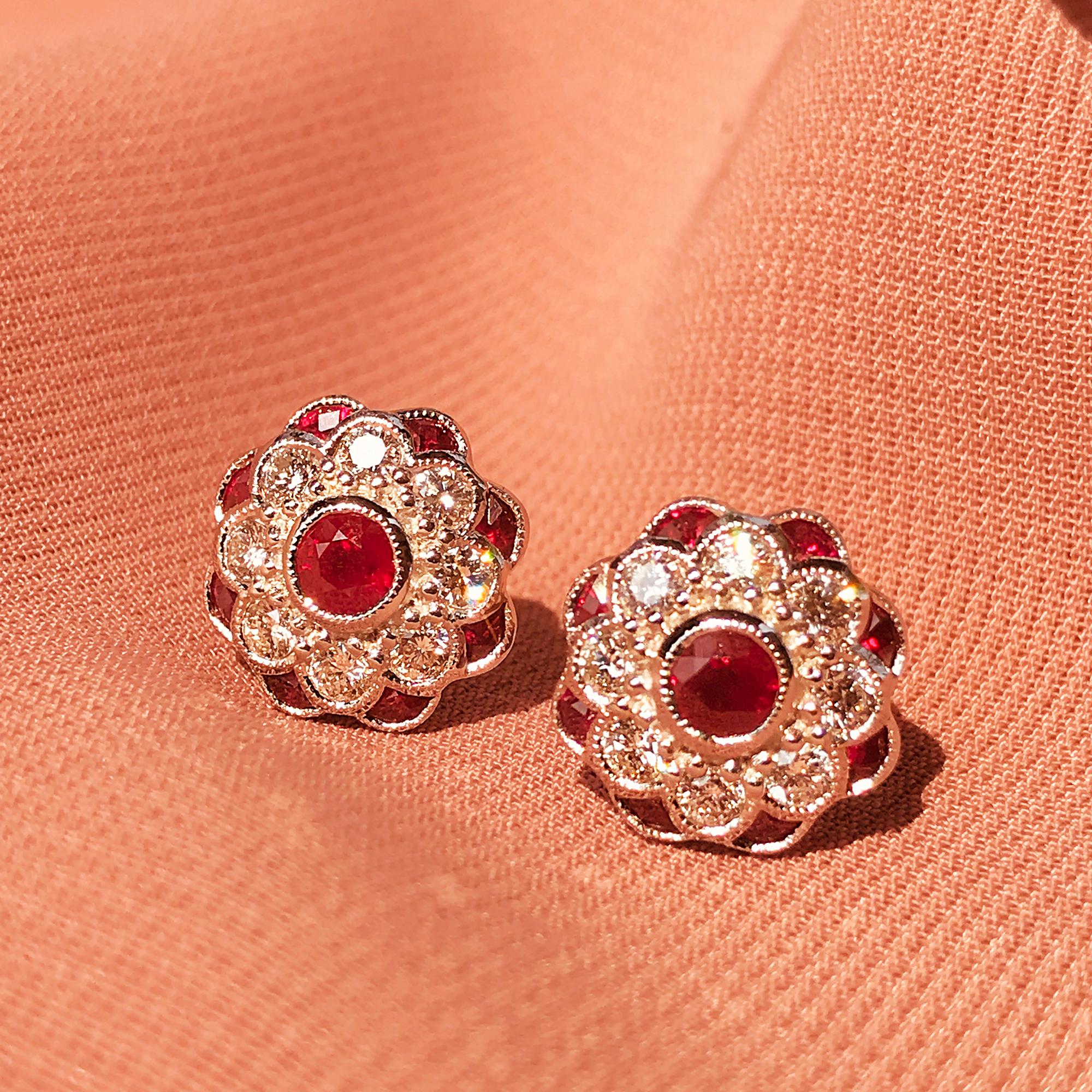 With a gorgeous design that includes a ruby center with diamond and ruby petals of peony flower design, these art-deco style earrings are ready to bloom on you. 

Information
Metal: 14K White Gold
Width: 12 mm.
Length: 12 mm.
Weight: 4.20 g.