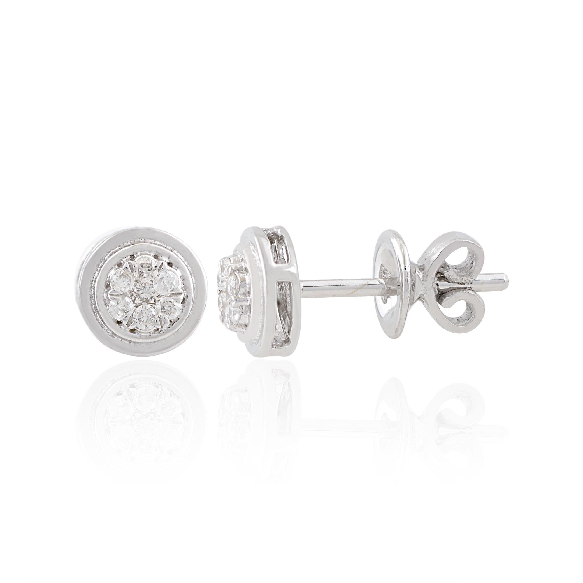 Step into the world of timeless elegance with these Natural 0.14 Carat SI/HI Diamond Stud Earrings, meticulously crafted in solid 10 Karat White Gold. These exquisite earrings are a celebration of understated sophistication and luxury, destined to