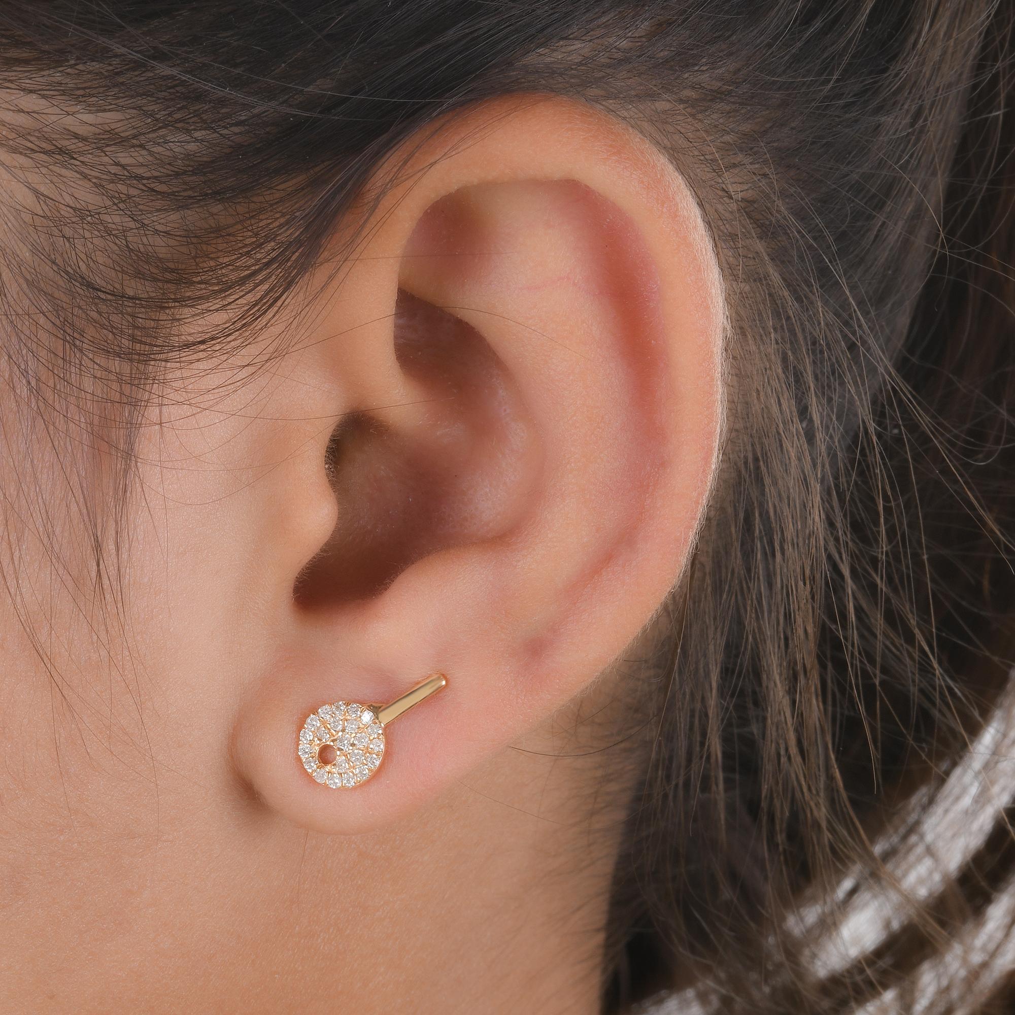 Crafted with meticulous attention to detail, these stud earrings feature a sophisticated design that exudes understated luxury. The warm glow of 14 karat yellow gold enhances the radiance of the diamonds, creating a harmonious contrast that adds