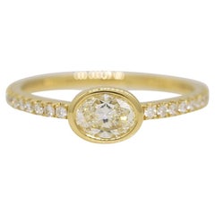 Natural 0.48 Carat Oval Shape Diamond Bezel Set 18-Karat Fashion Ring In Stock