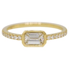 Natural 0.50 Carat Emerald Cut Diamond 18-Karat Bezel Set Fashion Ring In Stock