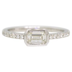 Natural 0.50 Carat Emerald Cut Diamond 18-Karat Bezel Set Fashion Ring In Stock