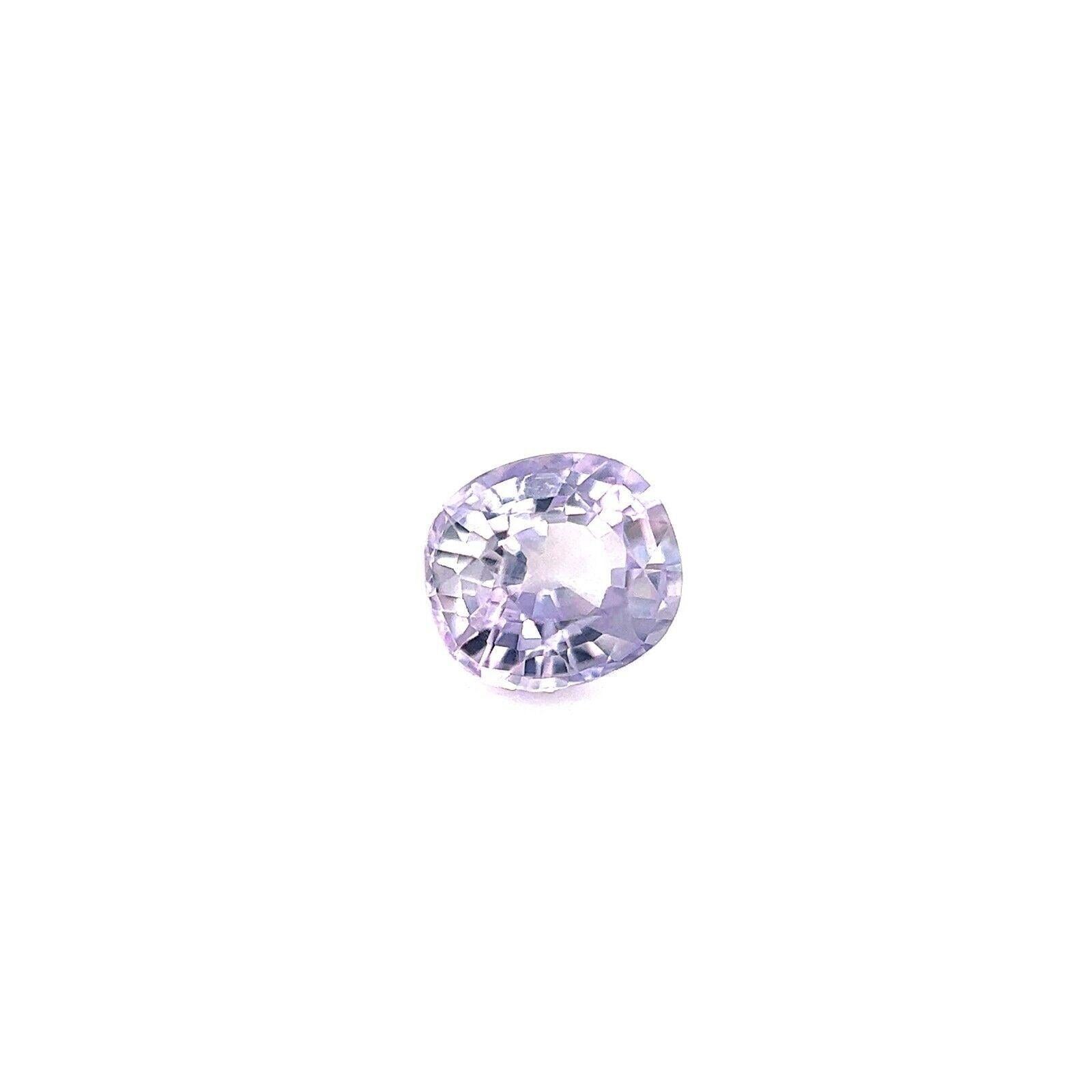 Natural 0.55ct Light Lilac Purple Ceylon Sapphire Oval Cut Loose Gem 4.8x4.5mm

Natural Light Purple Sapphire Gemstone.
0.55 Carat with a beautiful light purple colour and very good clarity, clean stone. Also has an excellent oval teardrop cut and