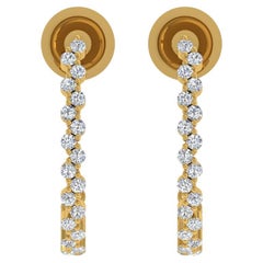Boucles d'oreilles en or jaune 18 carats diamant naturel 0.6 carat SI/H taille ronde et brillante