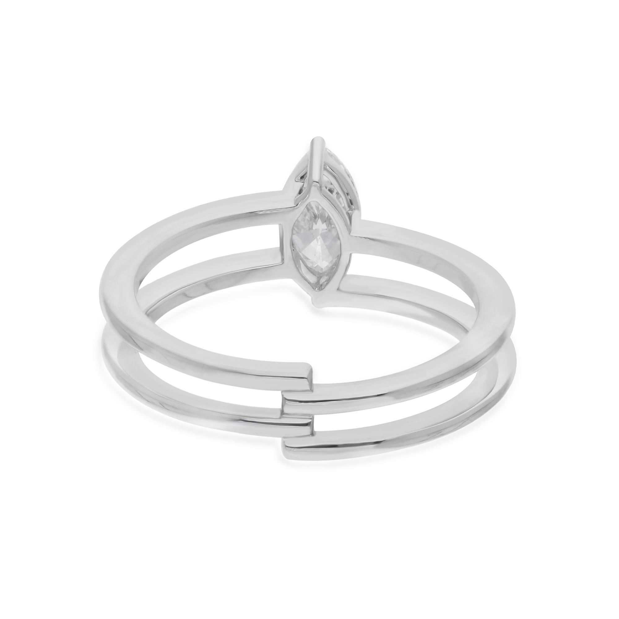 Indulge in the timeless elegance of this Natural 0.61 Carat Solitaire Marquise Diamond Ring, meticulously crafted in 14 karat white gold to symbolize everlasting love and sophistication. At the heart of this exquisite ring lies a stunning