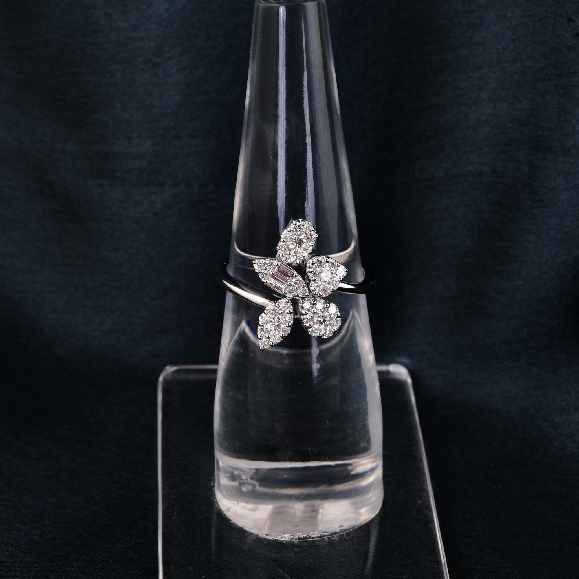 Realizzato in oro a 14 carati, questo squisito anello è impreziosito da 0,63 carati di diamanti scintillanti.

L'anello è una misura 7 US e può essere ridimensionato in una misura più grande o più piccola su richiesta. Segui la vetrina di Spectrum