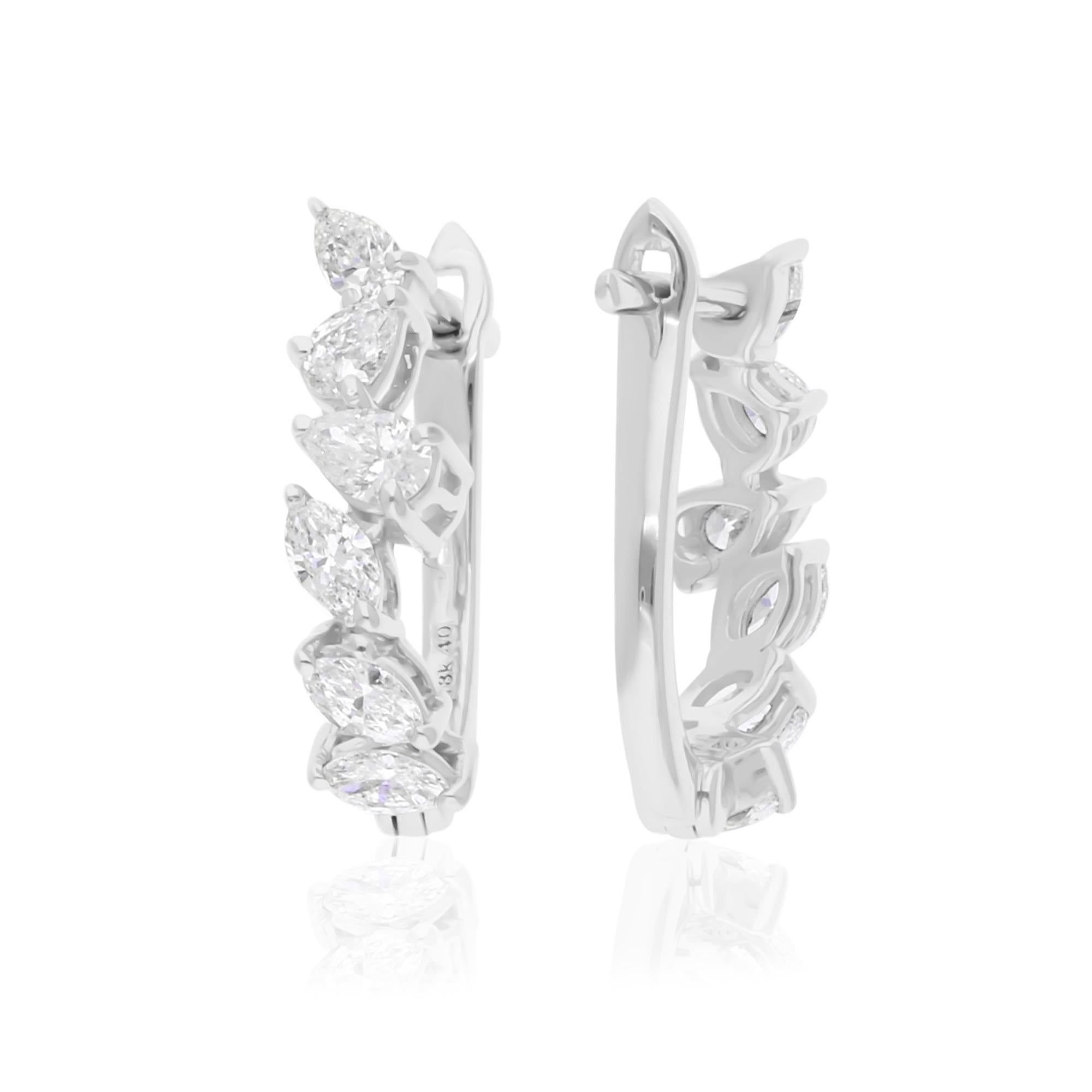 Coulées dans de l'or 18 carats, ces boucles d'oreilles exquises sont serties de 0,63 carats de diamants étincelants.

Suivez la vitrine de Spectrum Jewels pour découvrir la dernière collection et les pièces exclusives. Spectrum Jewels est fièrement