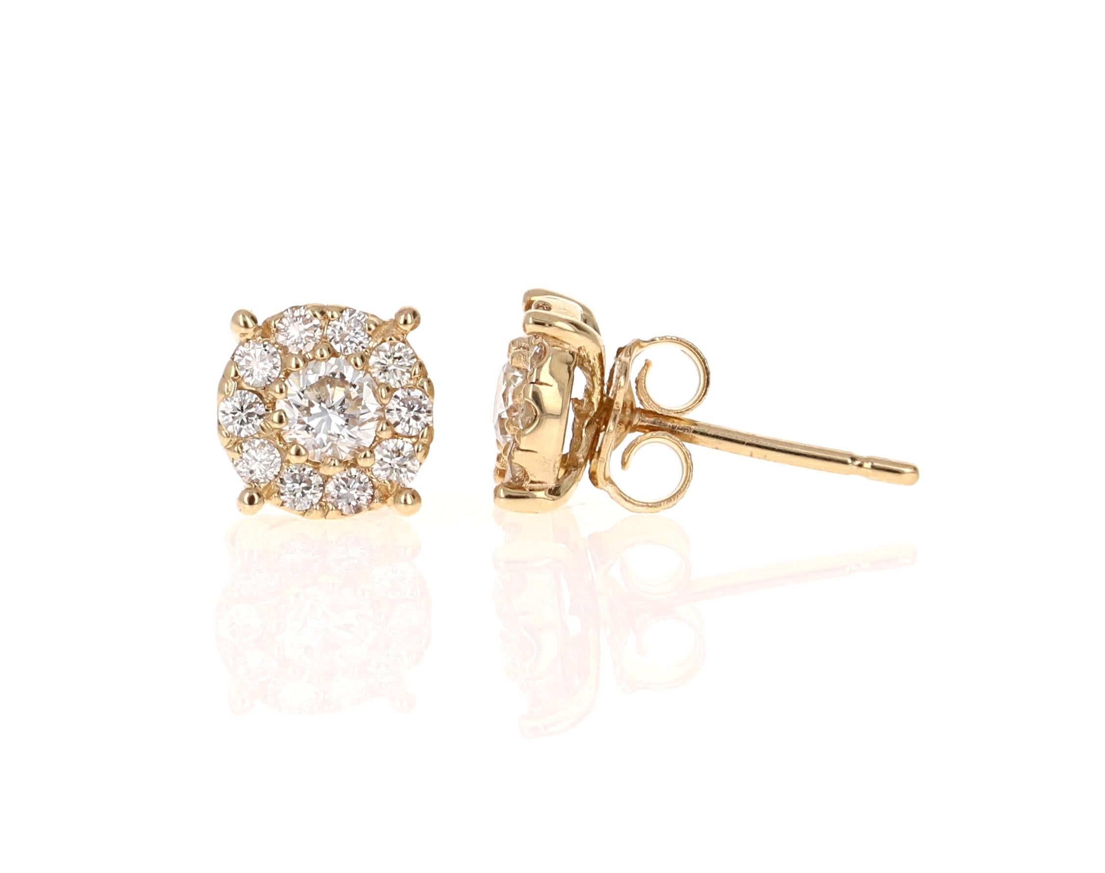 Orecchini di diamanti naturali da 0,75 carati taglio rotondo con design a fiore in oro giallo 14 carati

Questi orecchini di diamanti dal design classico hanno 22 diamanti di taglio rotondo che pesano 0,75 carati.  La purezza dei diamanti è VS2 e il