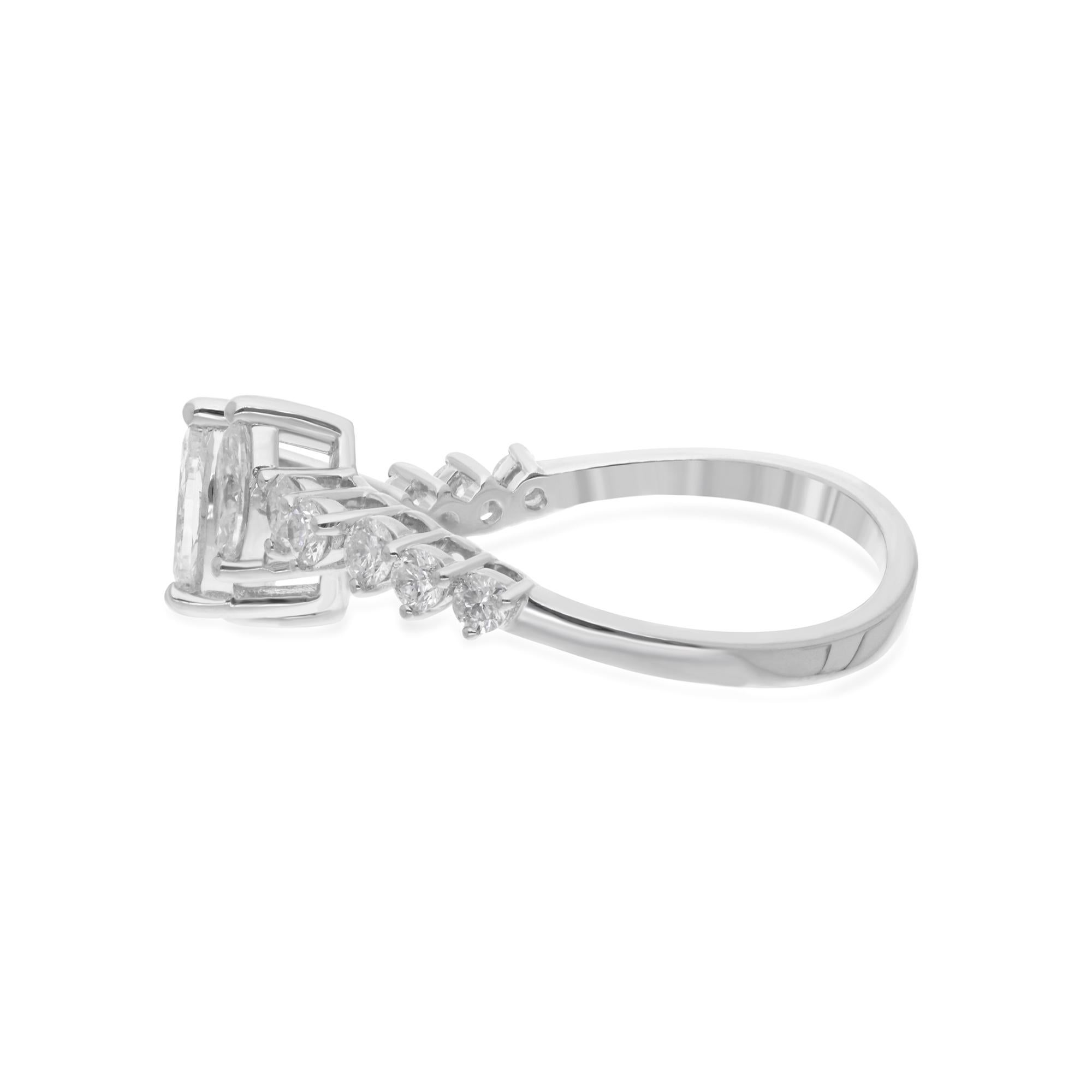 Step into a world of refined elegance and timeless beauty with our Natural 0.79 Carat Marquise Diamond Wave Design Ring, meticulously handcrafted in exquisite 14 Karat White Gold. This enchanting piece of jewelry is a celebration of sophistication