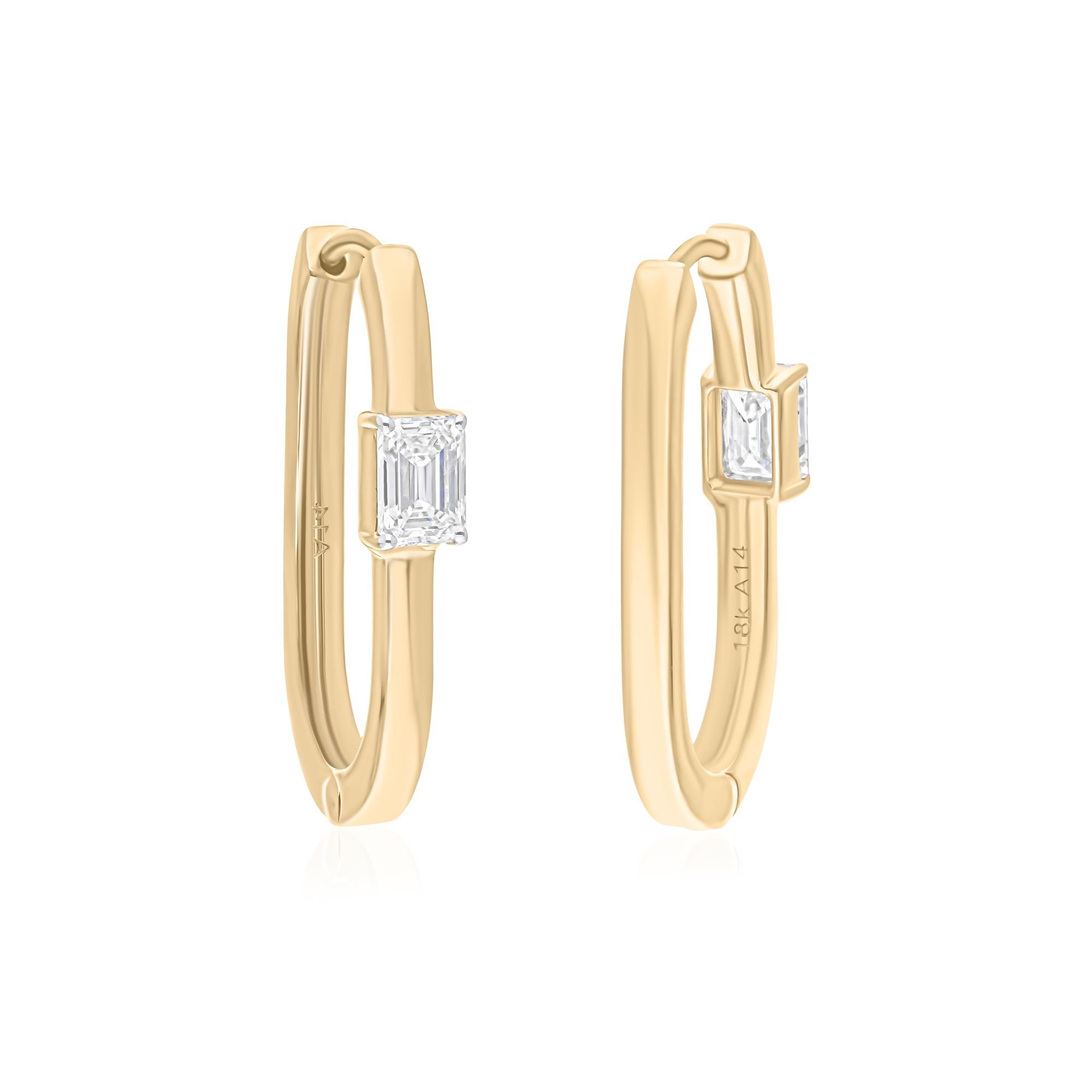 Coulées dans de l'or 18 carats, ces boucles d'oreilles exquises sont serties de 0,81 carats de diamants étincelants.

Suivez la vitrine de Spectrum Jewels pour découvrir la dernière collection et les pièces exclusives. Spectrum Jewels est fièrement