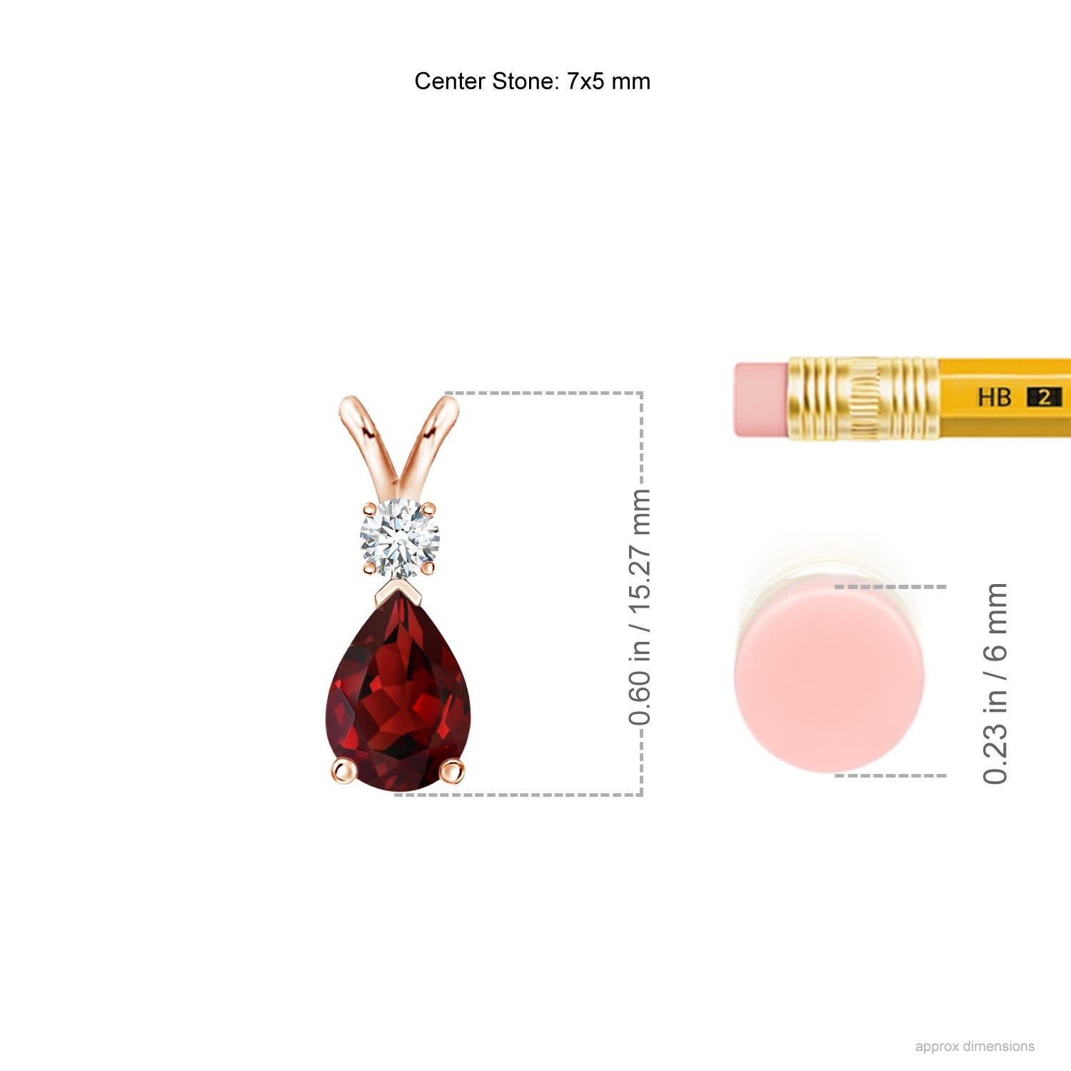 A pear-shaped intense red garnet is secured in a prong setting and embellished with a diamond accent on the top. Simple yet stunning, this teardrop garnet pendant with V bale is sculpted in 14k rose gold.