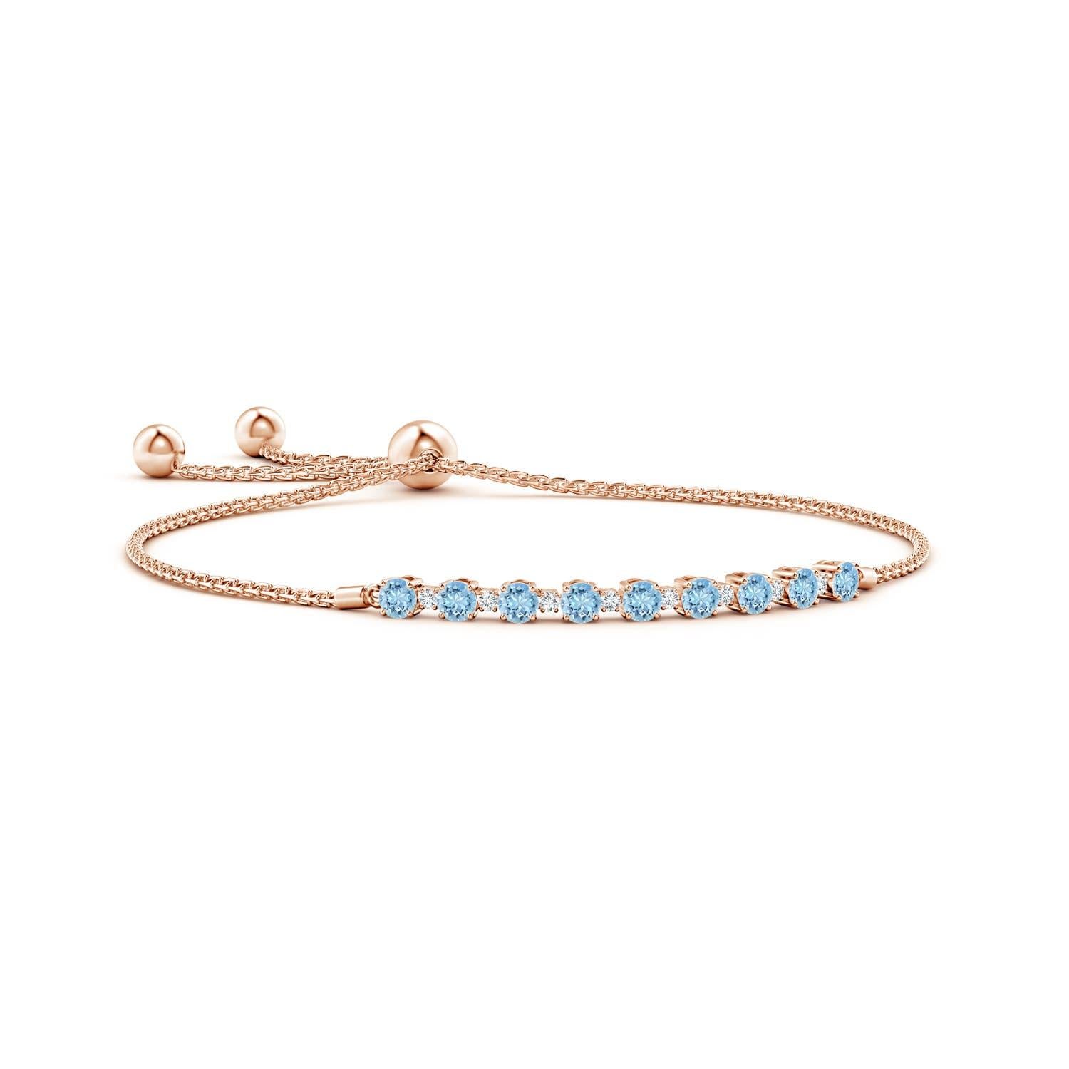 Des aigues-marines bleues et des diamants scintillants sont réunis sur ce bracelet bolo en or rose 14 carats. Elles sont serties en alternance et créent un look classique. Ce bracelet est réglable pour s'adapter à la plupart des poignets.