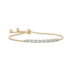 Pulsera de tenis de aguamarina natural de 0,90 ct y diamantes en oro amarillo de 14 quilates