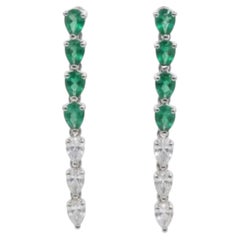 Boucles d'oreilles en or 18 carats avec une émeraude naturelle de 0,91 carat et un diamant de 0,56 carat
