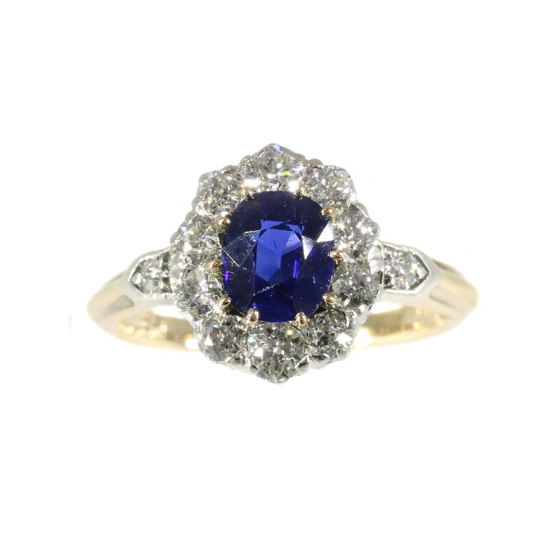 This charming Victorian 18K gold engagement ring with a diamond cluster of 12 old brilliants surrounding a natural untreated Burma sapphire as deep blue as the seven seas combined.

No matter how strong the tidal waves of fashion, no matter how