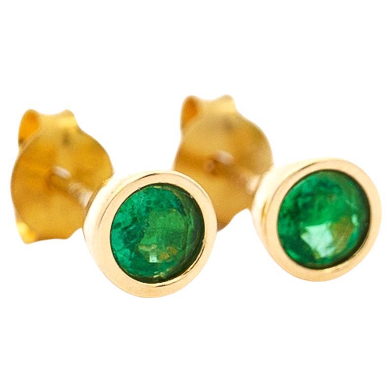 Natural 1/2 Carat Emerald Round Bezel Stud Earrings in 14K Yellow Gold For Sale
