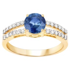 Ring aus 14 Karat Gelbgold mit natürlichem 1 Karat blauem Saphir und Diamant