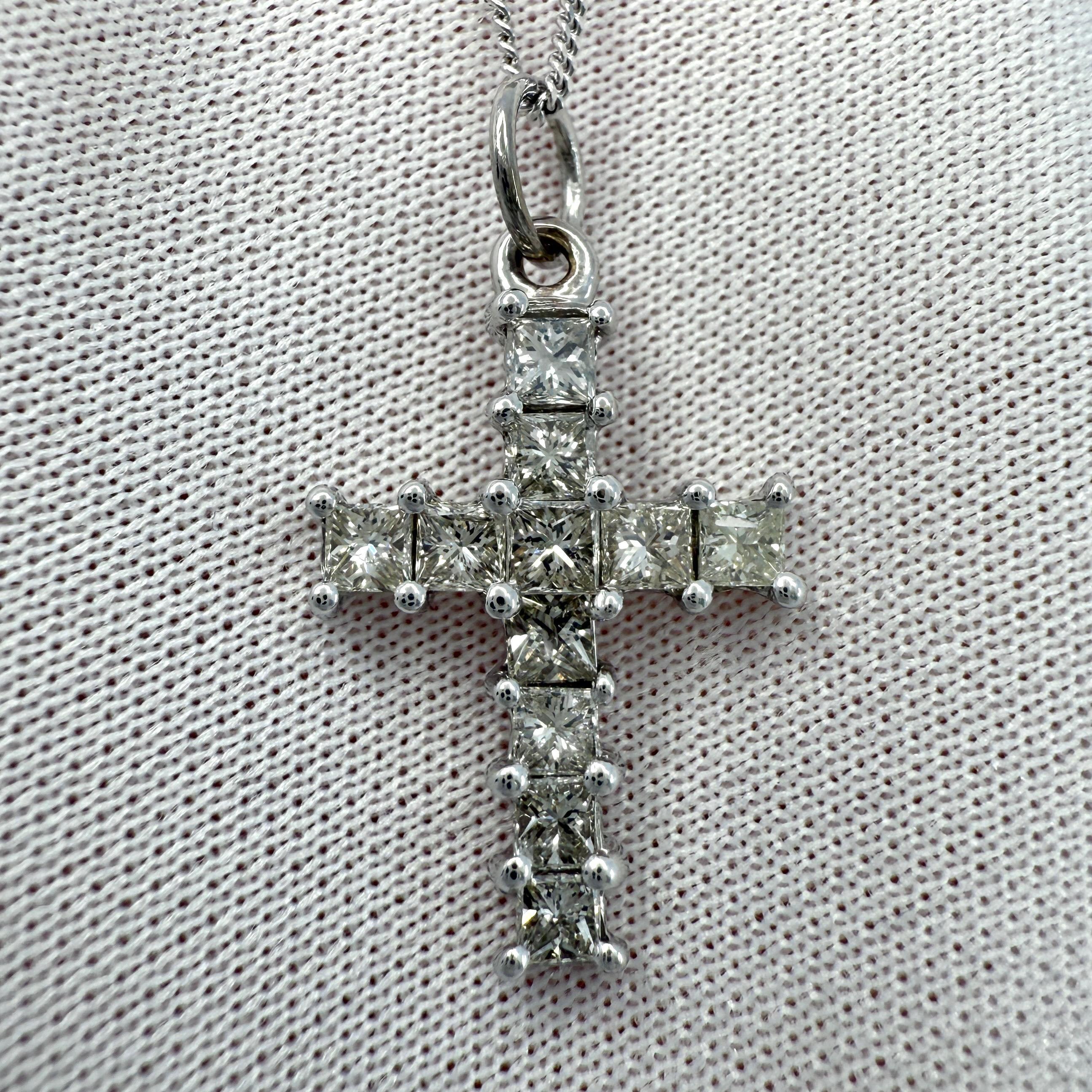 Natural 1.00ct Princess Cut Diamond Cross 18k White Gold Pendant Necklace.

A beautiful natural diamond cross, set with 2.3 - 2.4mmmm princess cut natural diamonds. Approx. I-L colour and Si1-I1 clarity. Some small natural inclusions visible when