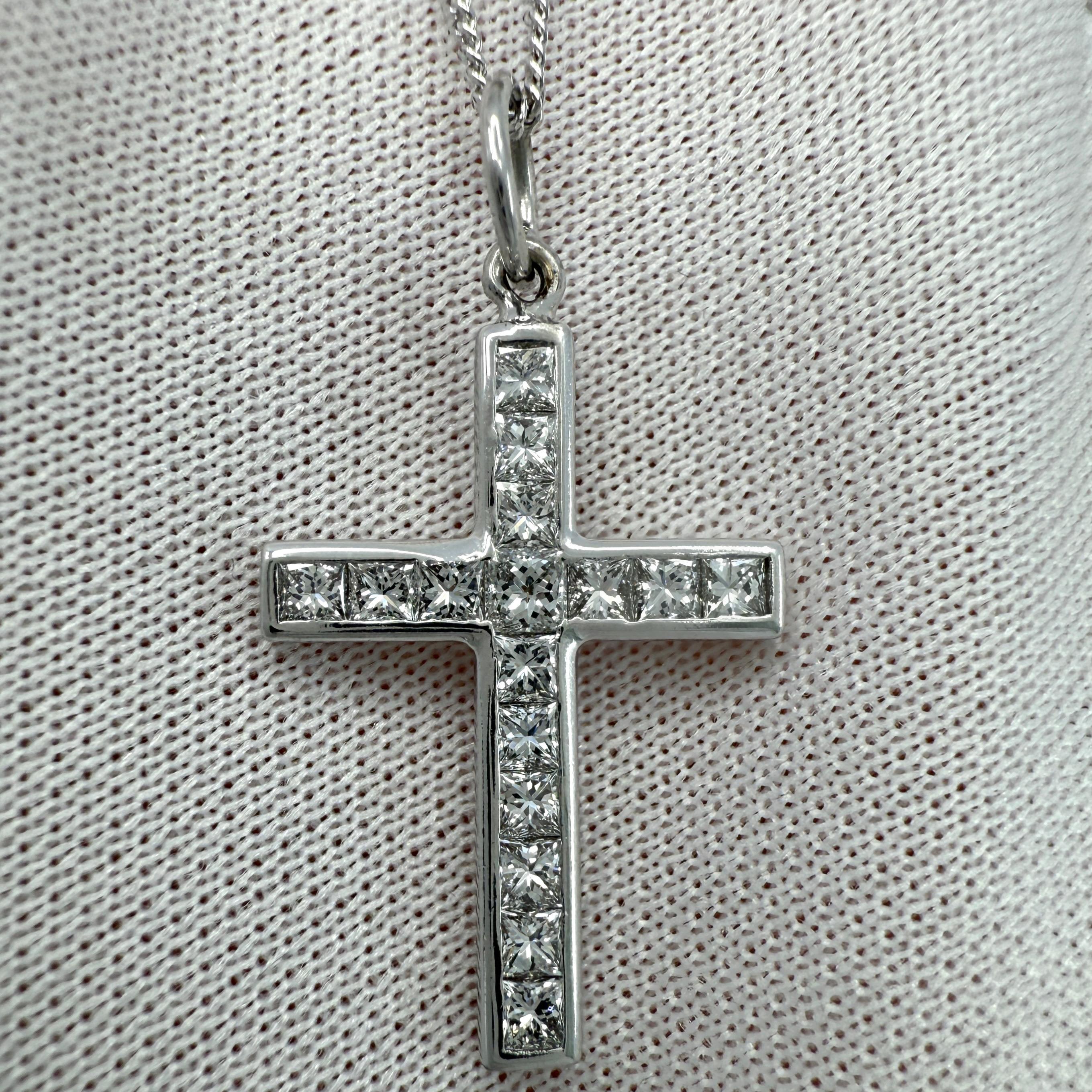 Natural 1.00ct Princess Cut Diamond Cross 18k White Gold Pendant Necklace.

A beautiful natural diamond cross, set with 2mm princess cut natural diamonds. All with an excellent cut, clarity and colour. Approx F/G colour and VVS clarity. Excellent