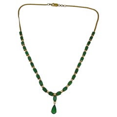 Collier avec pendentif en émeraude et diamants, en or 18 carats, émeraude de 10,10 carats