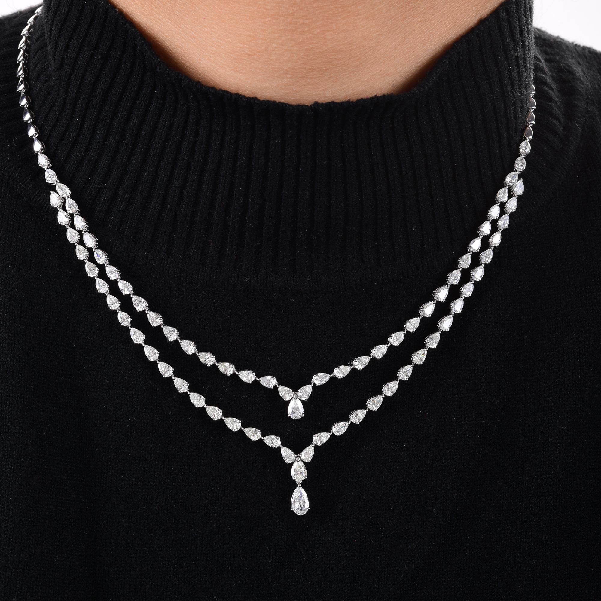 Questa collana a catena multipla in oro bianco 14 carati con diamanti naturali da 10,32 carati sembra essere composta da diamanti piccoli e di dimensioni uniformi e da una linea separata di diamanti che scendono dalla catena principale per formare