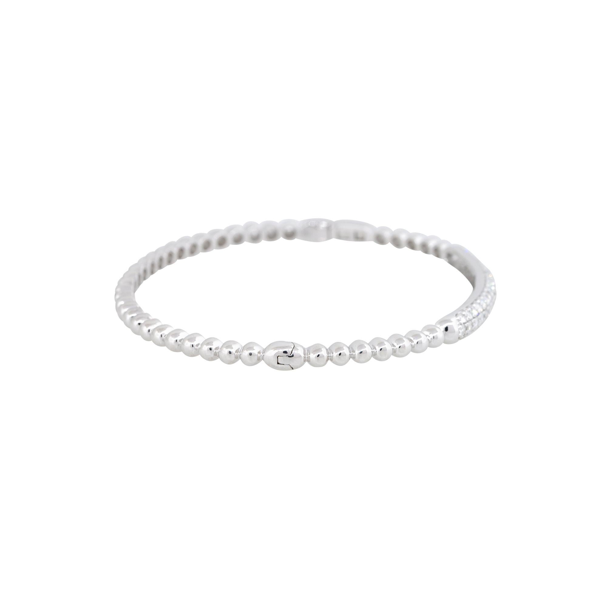 Natürlicher 1,06 Karat Pave Diamant 18-Karat Beaded Bump Armreif

Dieser exquisite Armreif mit einem 1,06-Karat-Diamanten in Pflasterung zeichnet sich durch seine aufwändige Verarbeitung in 18-karätigem Weißgold aus. Das Design besteht aus zarten