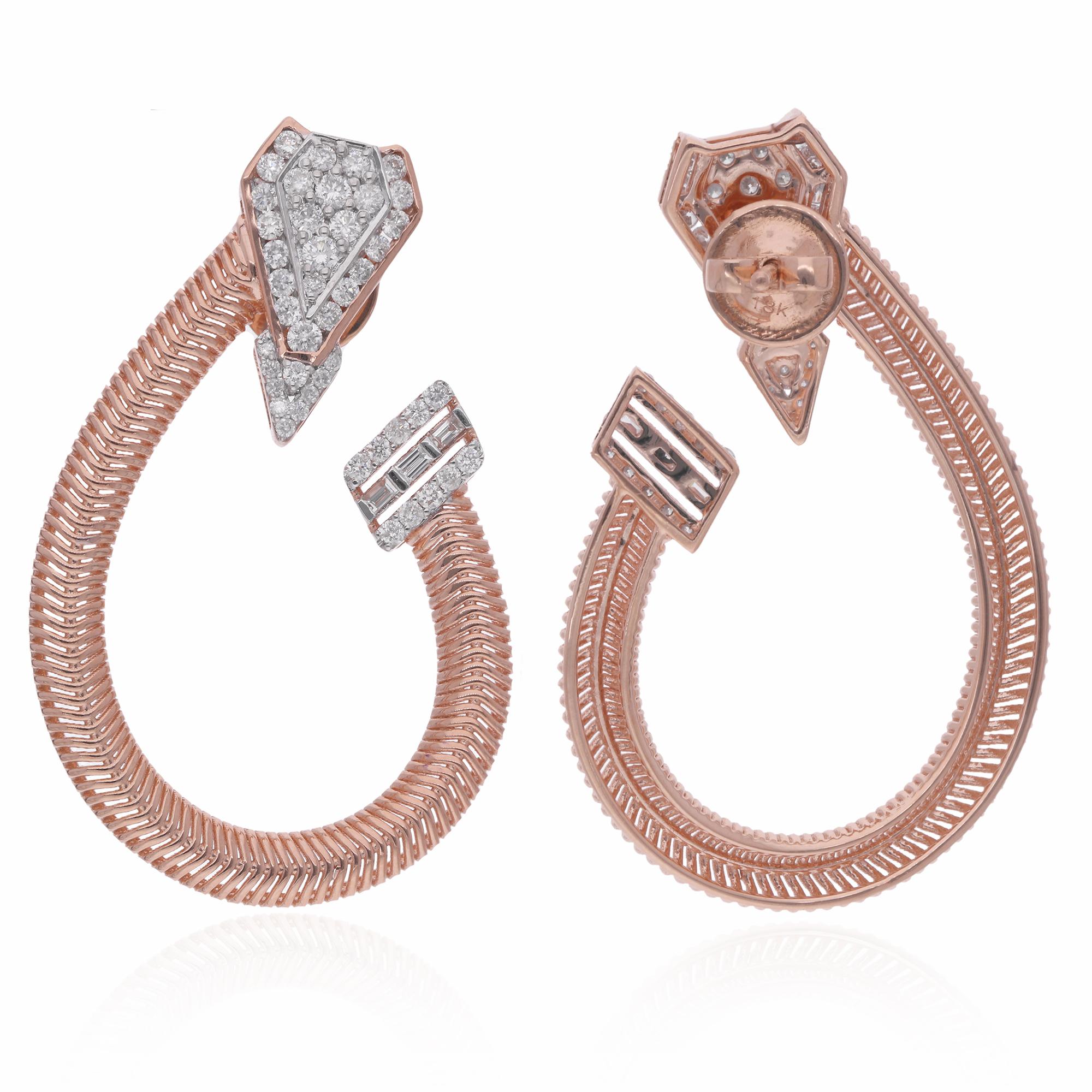 Indulge in the luxurious allure of these Natural 1.07 Carat Baguette & Round Diamond Hoop Earrings, exquisitely crafted in 14 karat rose gold. Each earring features a captivating combination of baguette and round diamonds, meticulously arranged to