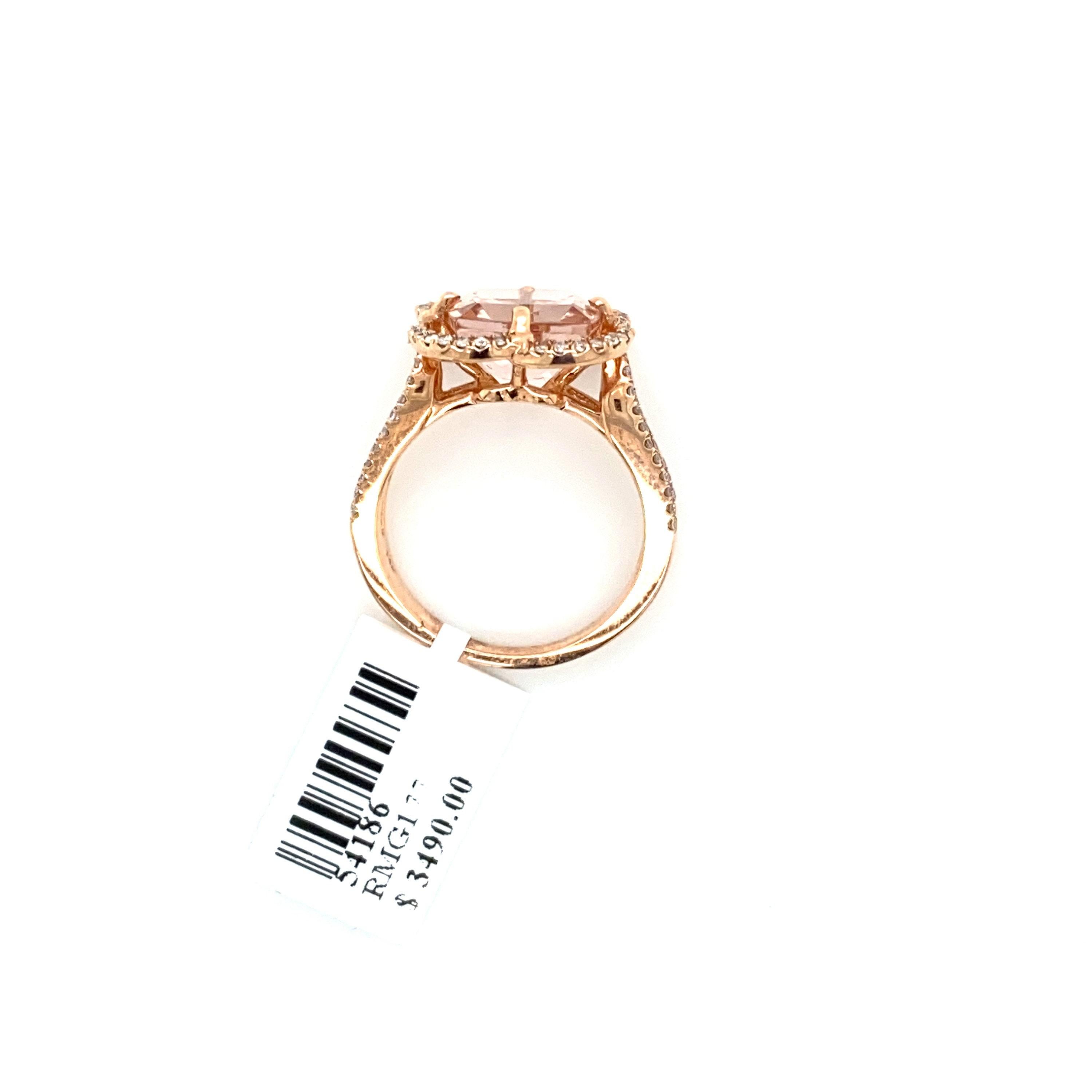 This is a stunning natural 3.85carat morganite and clover shaped diamond halo ring set is in solid 14K rose gold. The natural 10MM cushion cut morganite has an excellent peachy pink color (features almost 4 carats of AAA quality morganite) and is