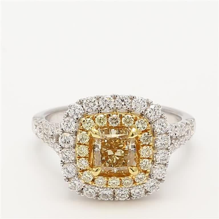 Rare radiant natural yellow diamond surrounded with natural round yellow and white diamonds. This ring is designed to be in a simple setting. Can be used as an engagement ring or in addition to your collection of jewels. 

Total Weight:
