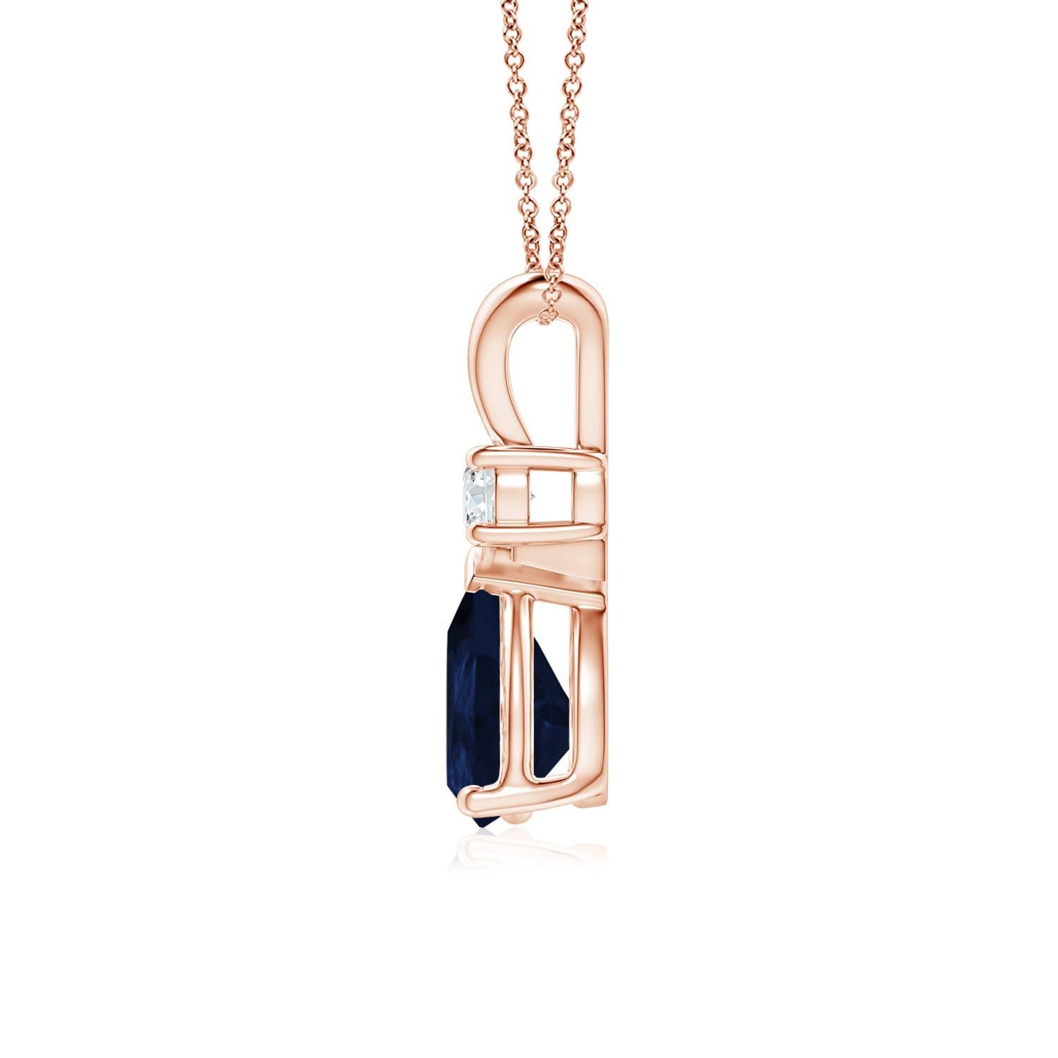 This classic solitaire pendant features a pear-shaped sapphire secured in a prong setting. A brilliant round diamond sits atop the blue gemstone adding to the design's charm. Simple yet appealing, this sapphire pendant in 18k rose gold is crafted