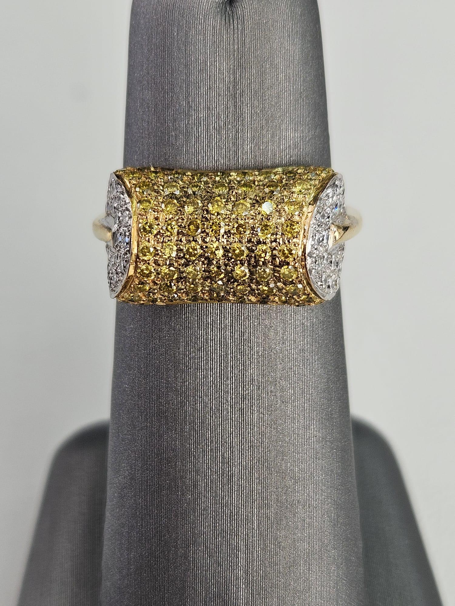
Introducing a truly unique and enchanting ring that defies conventional design norms. This exceptional piece features a horizontally oriented cylindrical formation, extending halfway across the ring, making a bold statement of contemporary