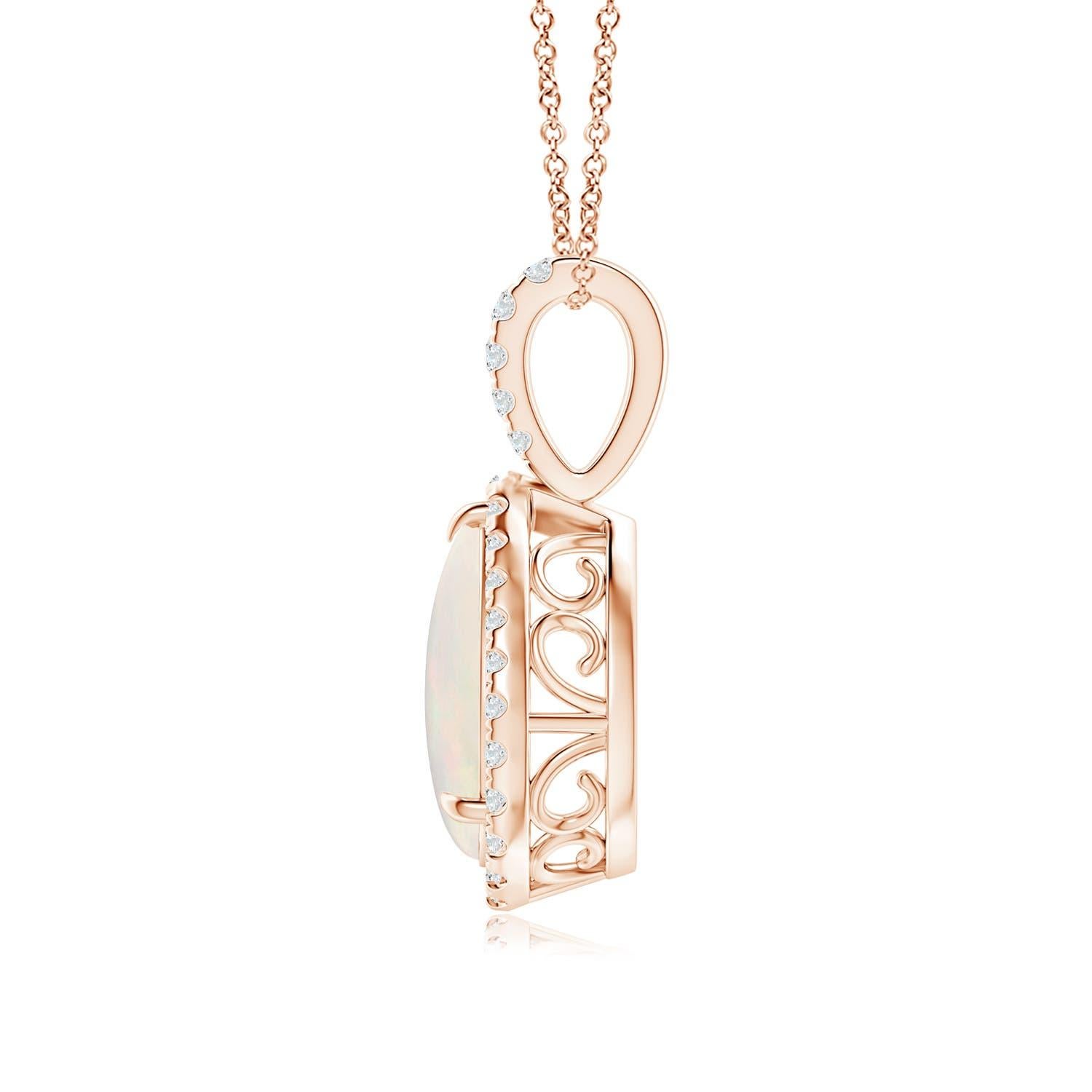 Dal fascino misterioso, questo ciondolo opale cabochon a goccia in oro rosa 18 carati affascina con il suo seducente gioco di colori. Un'aureola di diamanti scintillanti circonda la gemma incastonata a griffe. La balla singola tempestata di diamanti