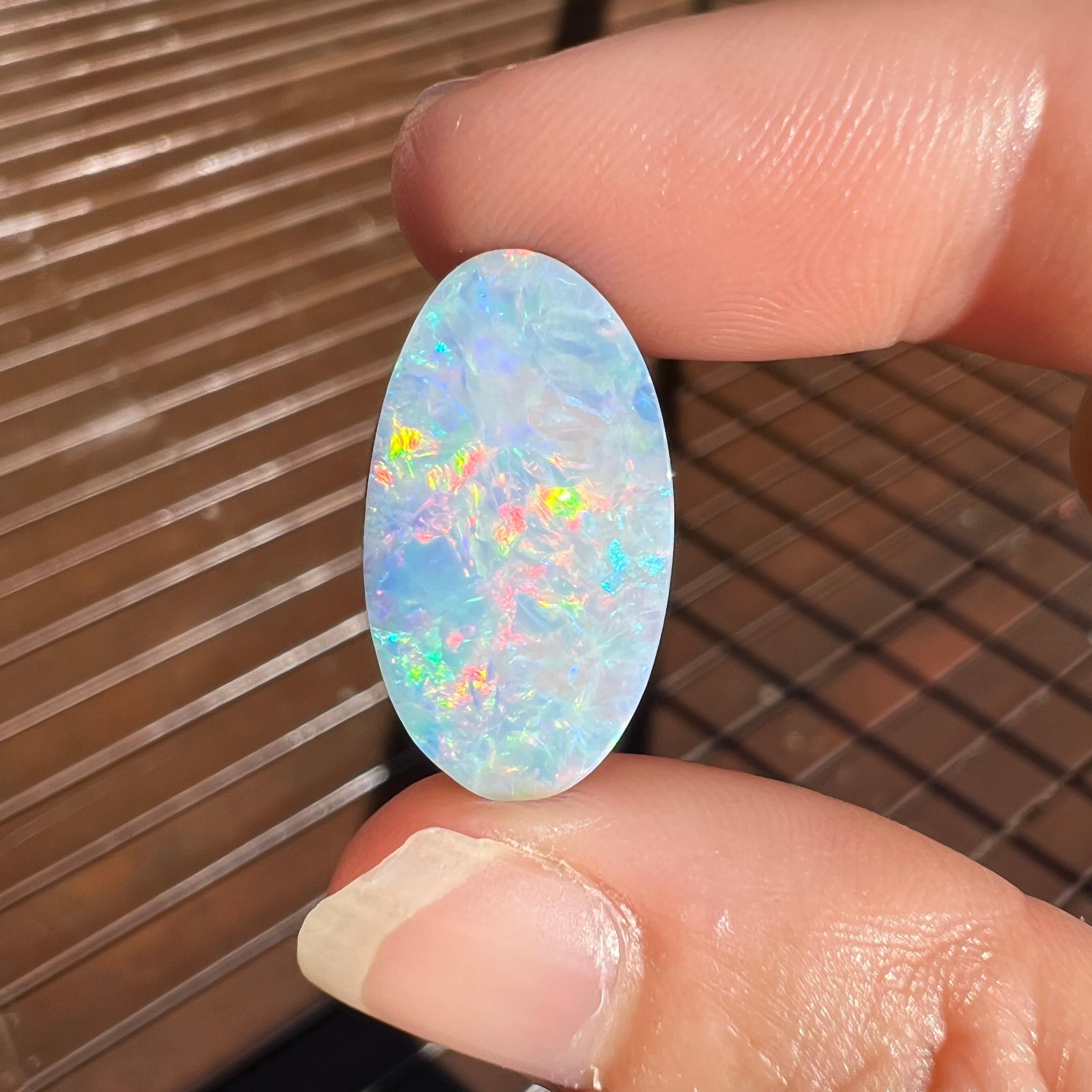This beautiful 11.52 Ct Australian boulder opal was mined by Sue Cooper at her Yaraka opal mine in Western Queensland, Australia in 2021. Sue processed the rough opal herself and cut into into a classic oval shape. We love how this opal contains the